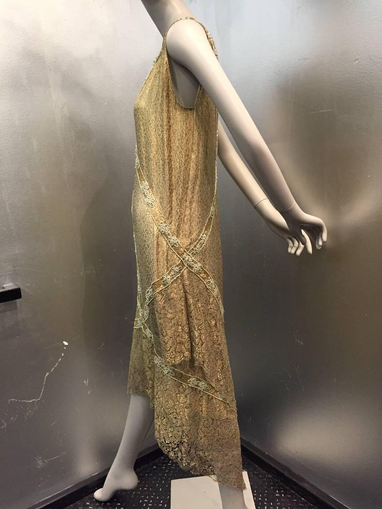 1920s Exceptional evening dress and ostrich wrap ensemble:  Dress made by Thurn - New York - Paris.  exquisite gold lamé tiered lace, and banded trim in faux pearl and aquamarine rhinestones. 1920s Feather vest/jacket is a beautiful match for this