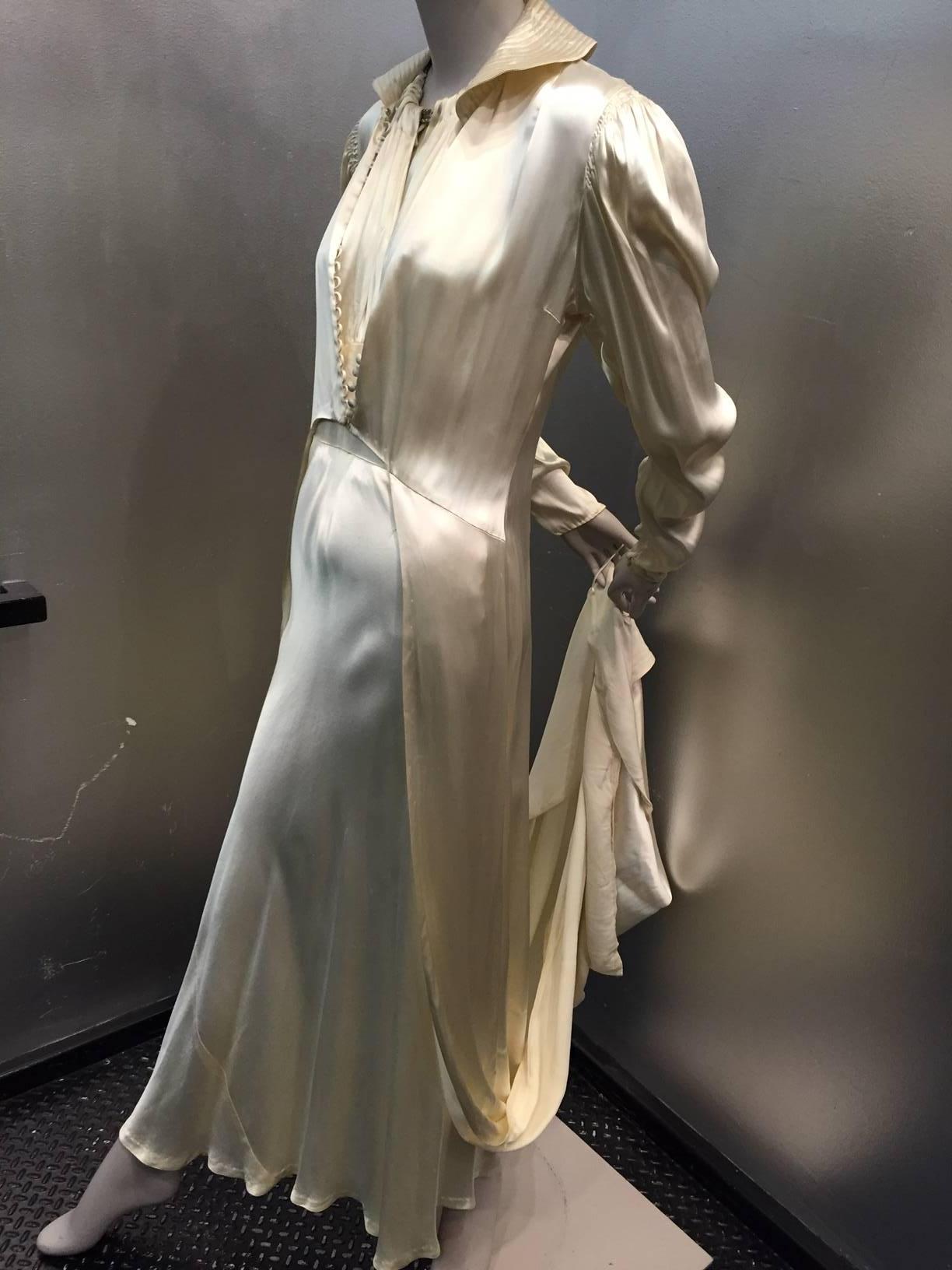 1930s beautiful 2-piece bridal ensemble:  Bias-cut gown with rhinestone neck detail and keyhole front and back. Side zipper. Coat is true Art Deco era loveliness:  Trapunto stitched stand-up collar, button-down front and cut-away detail. 