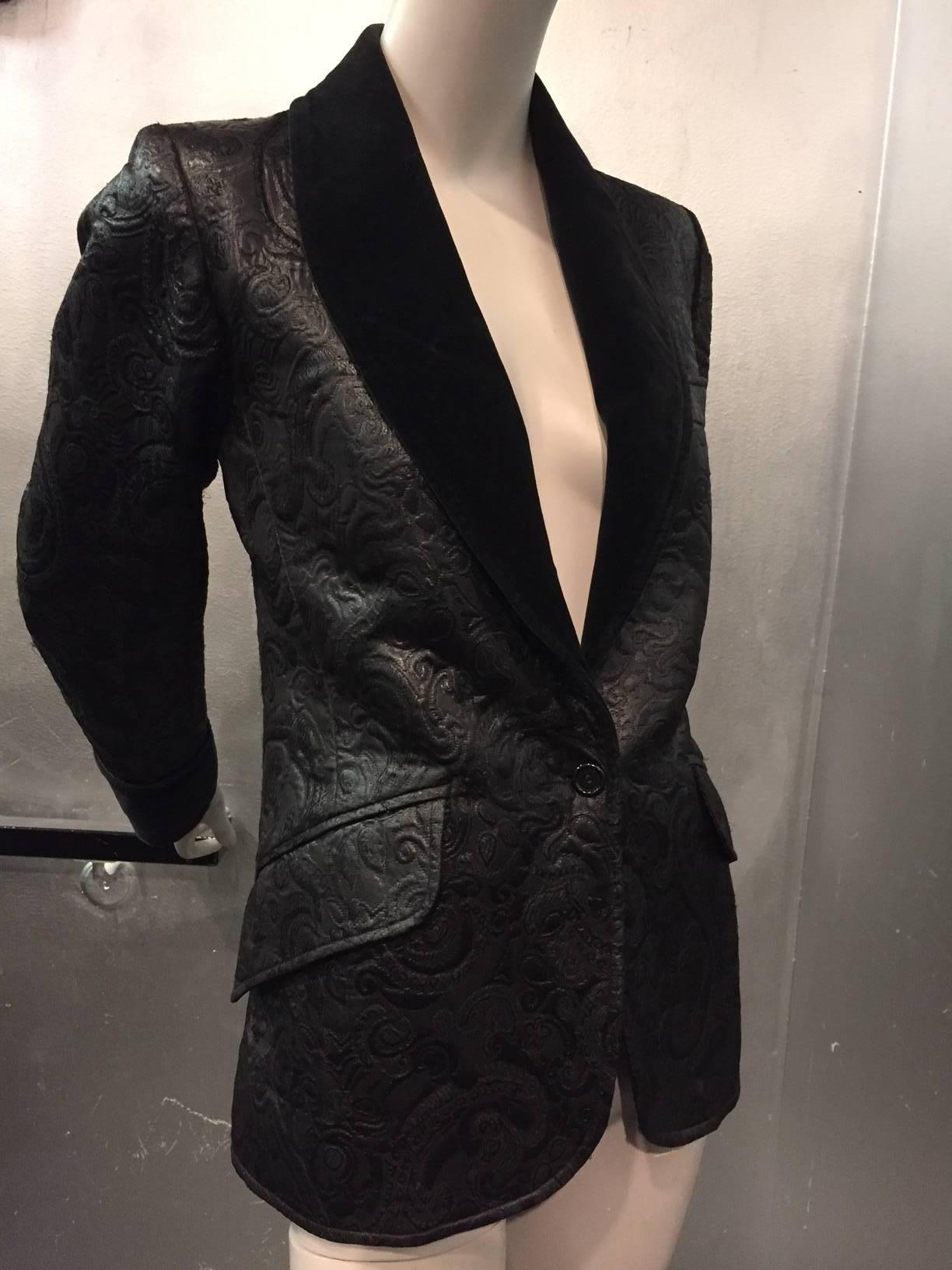 1970s Yves Saint Laurent for Saint Laurent Rive Gauche: Black matelassé smoking jacket with velvet shawl collar and cuffs. Single-button front closure. Flap pockets.  So Chic. 