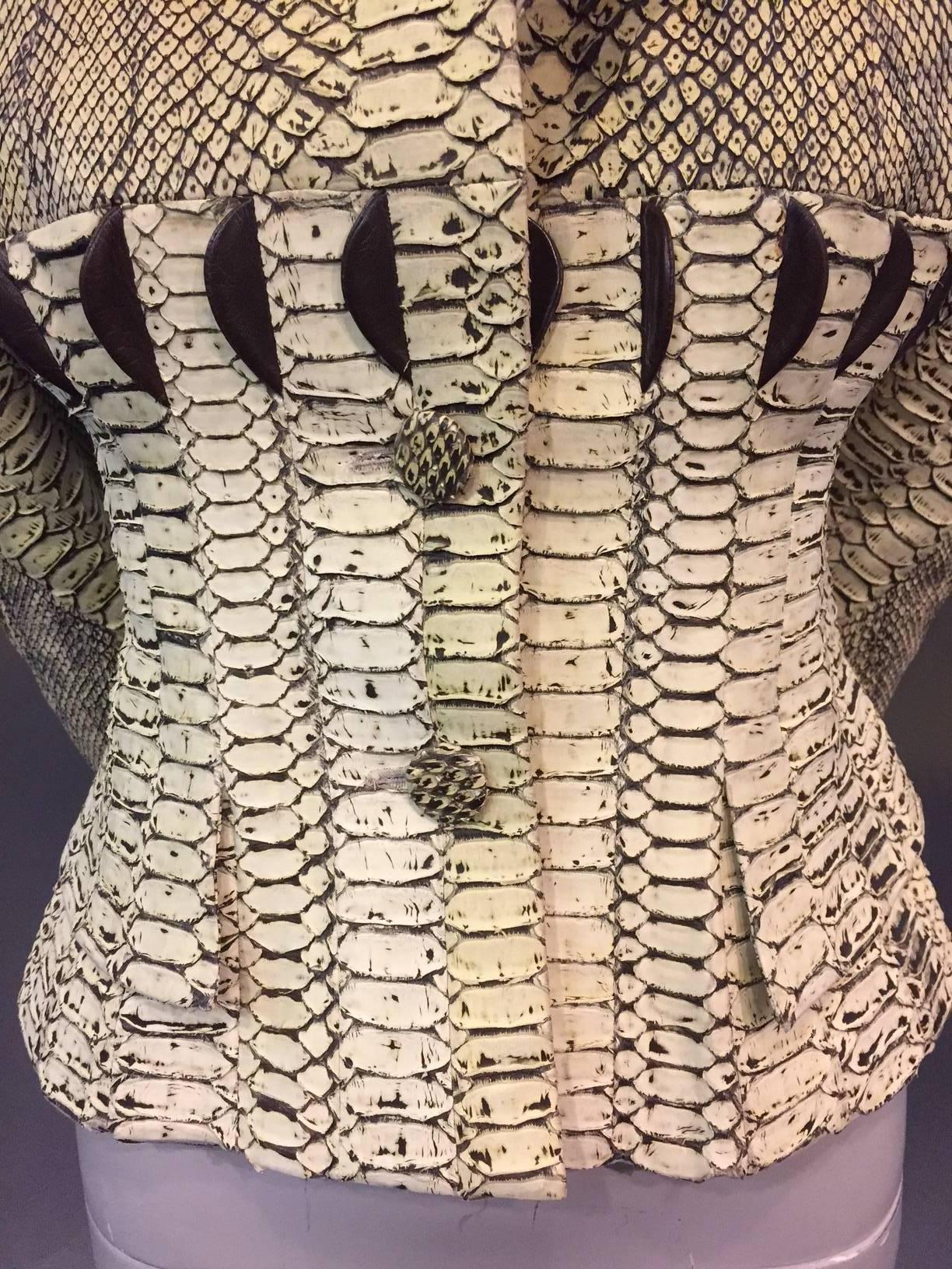 This is an incredibly gorgeous 1980s Givenchy Haute Couture natural snakeskin fitted jacket designed by the master himself, with so much detail!  Belly skins are used all around the mid section to create a corset-like appearance.  Discreet flap