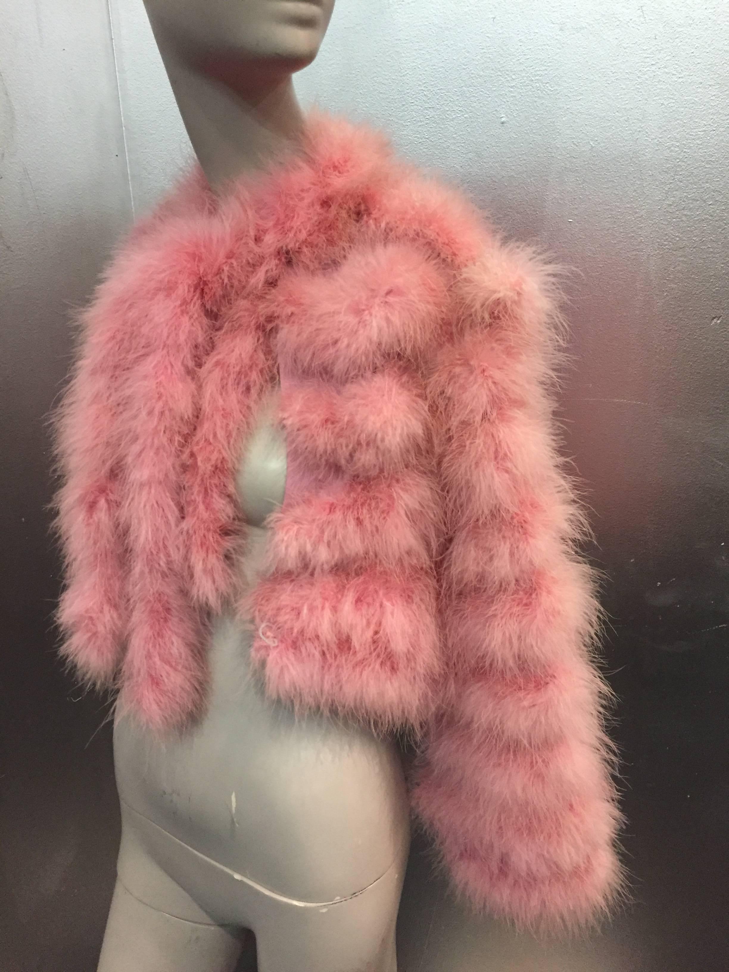 A gorgeous 1970s cotton candy pink tiered marabou feather jacket with double tie at neckline and front hook.  Fully lined. 