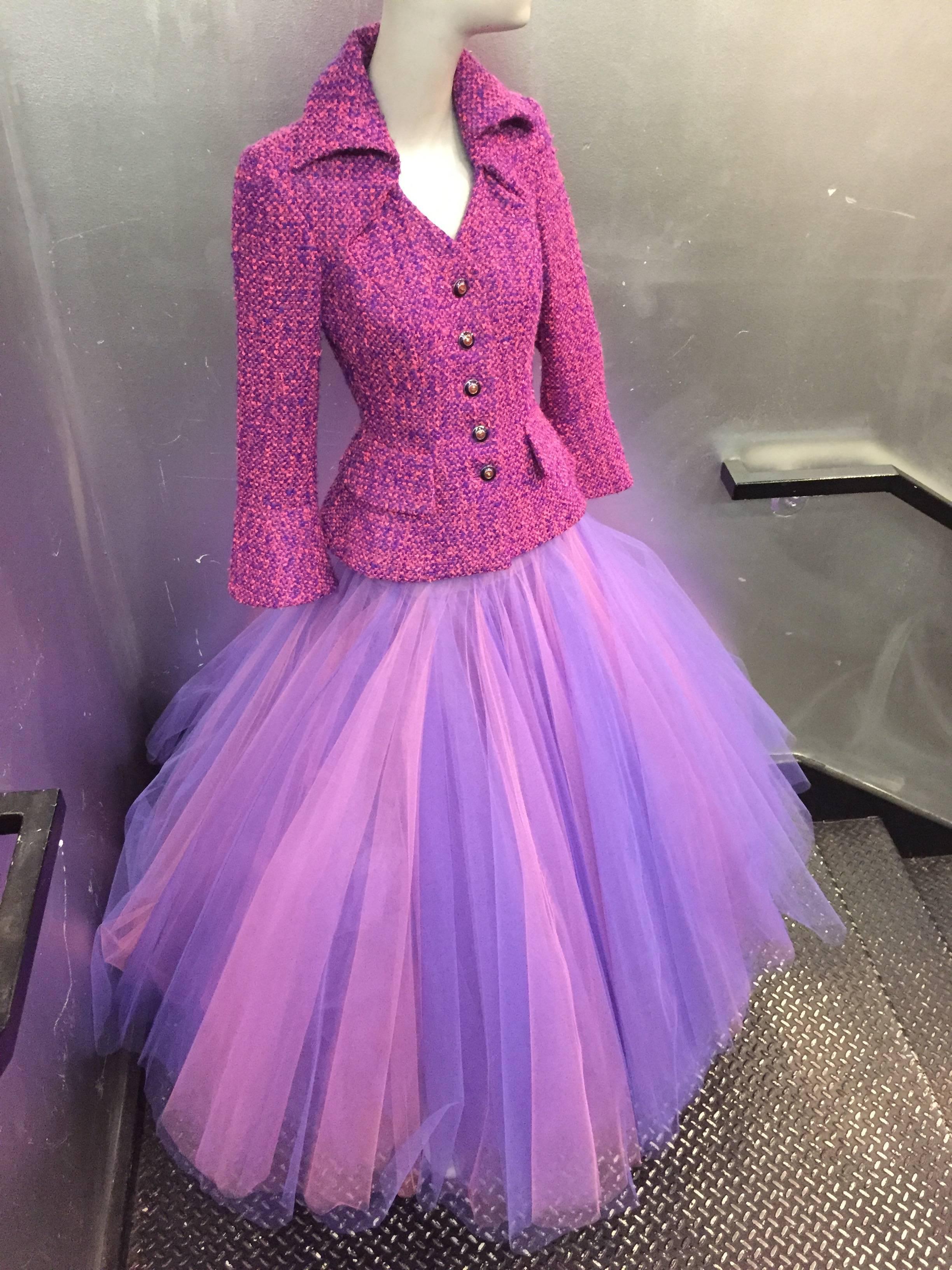 A fabulous 1990s Jacque Fath wool tweed jacket and tulle ball skirt ensemble in fuchsia and purple.  Jacket has lovely rolled collar, hip pockets and is styled in the Dior 