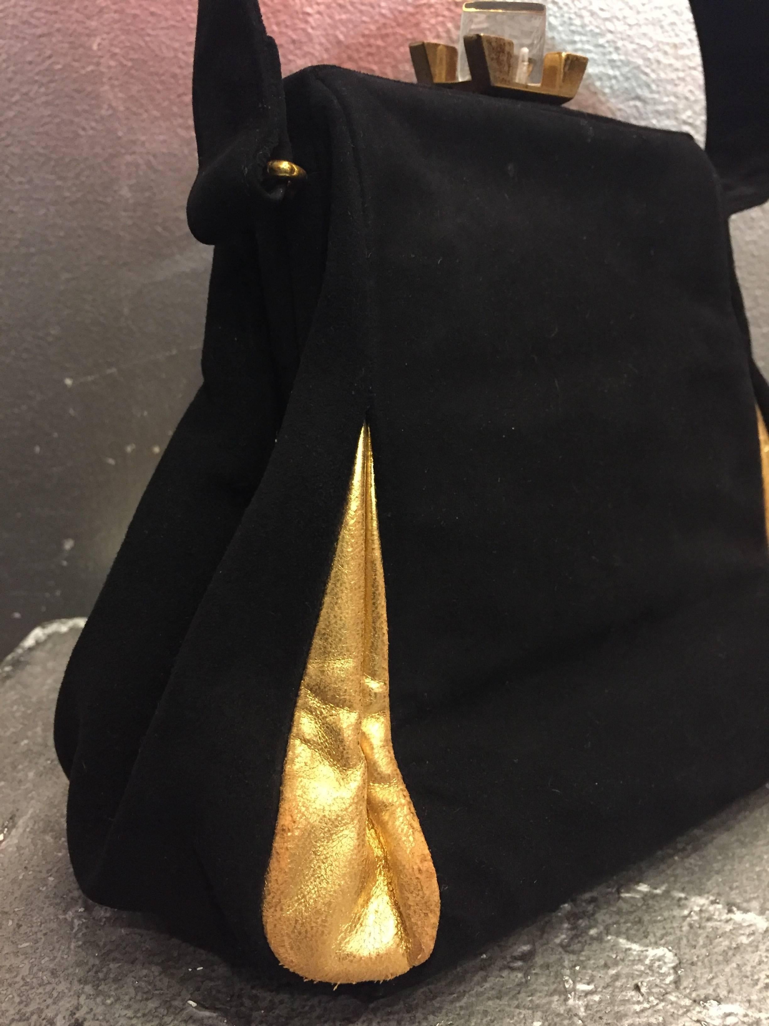 A gorgeous 1940s Theodor black suede and gold gilt leather handbag with lucite and gold-tone clasp and satin lining.  Original coin purse. 
