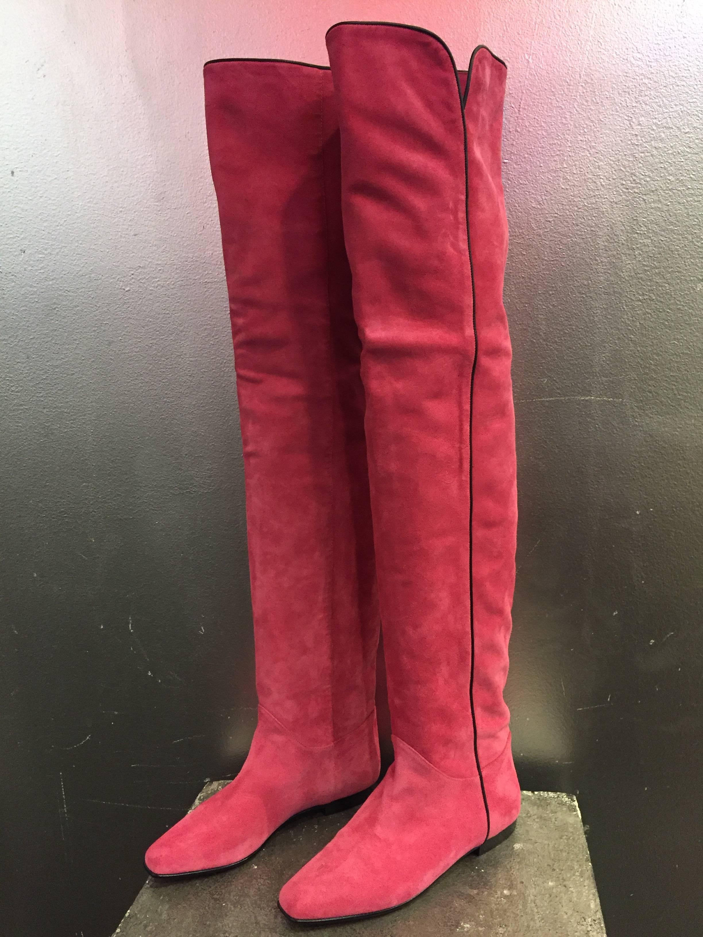1980s Yves Saint Laurent over-the-knee pink suede flat boots w black piping.  Squared toe box. Never worn. Size 7M. 