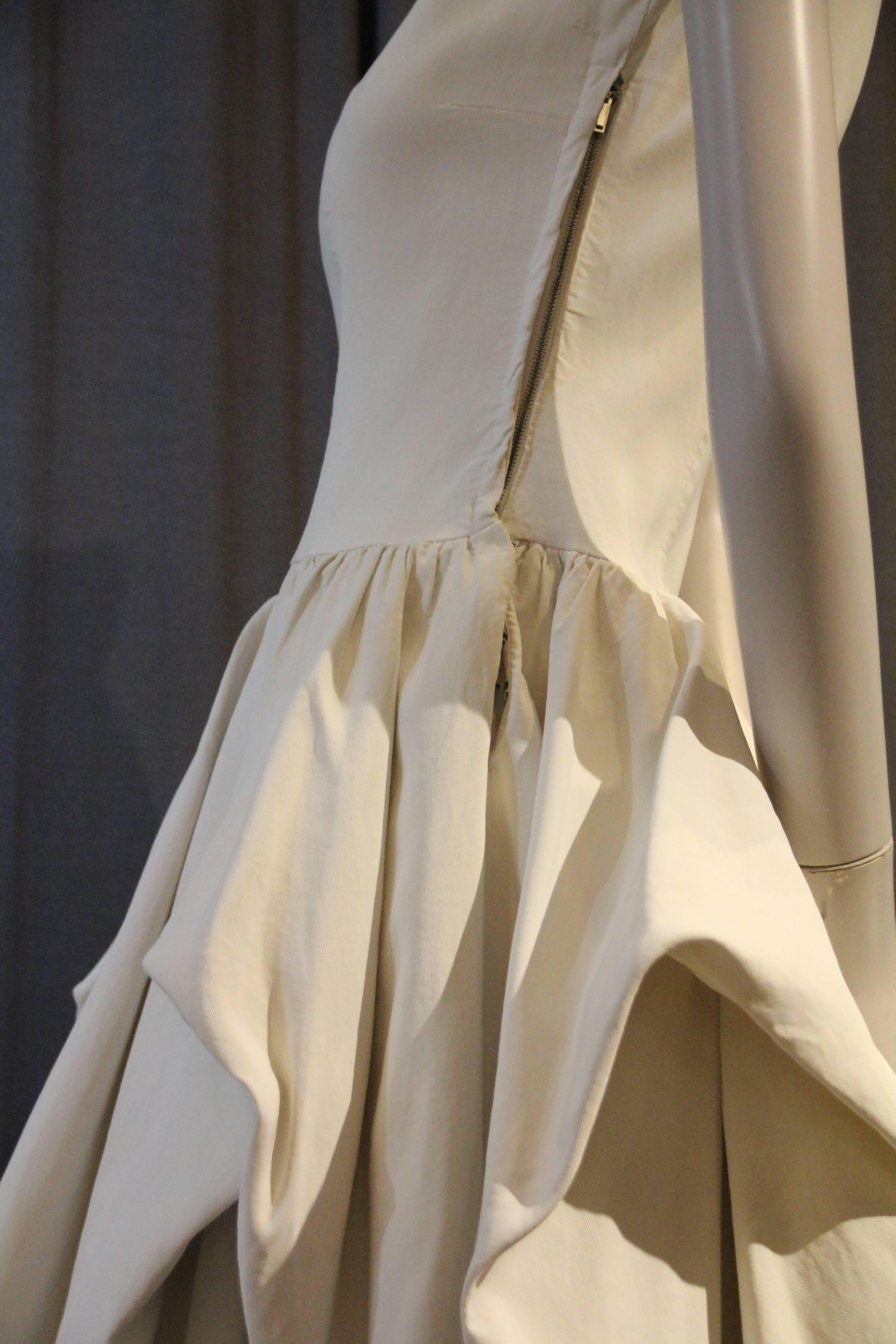 A gorgeous late 1940s Ceil Chapman ivory rayon faille ball gown with cap sleeves, fitted waist and voluminous side hip 