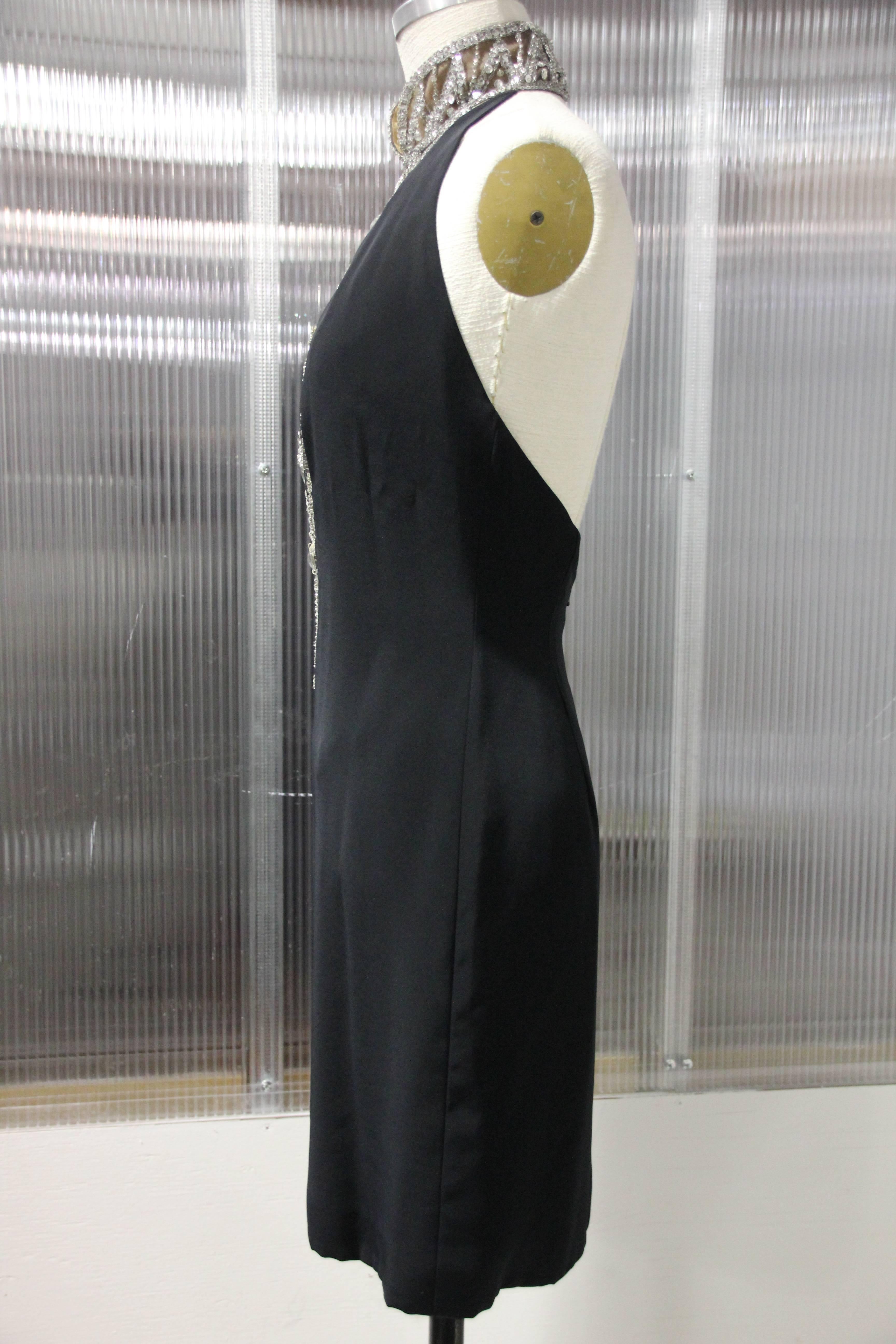 1980s Bob Mackie silk crepe little black mini dress w nude illusion decolletage embellished in Art Deco -styled rhinestones.  Low-cut back with zipper. Lined. 