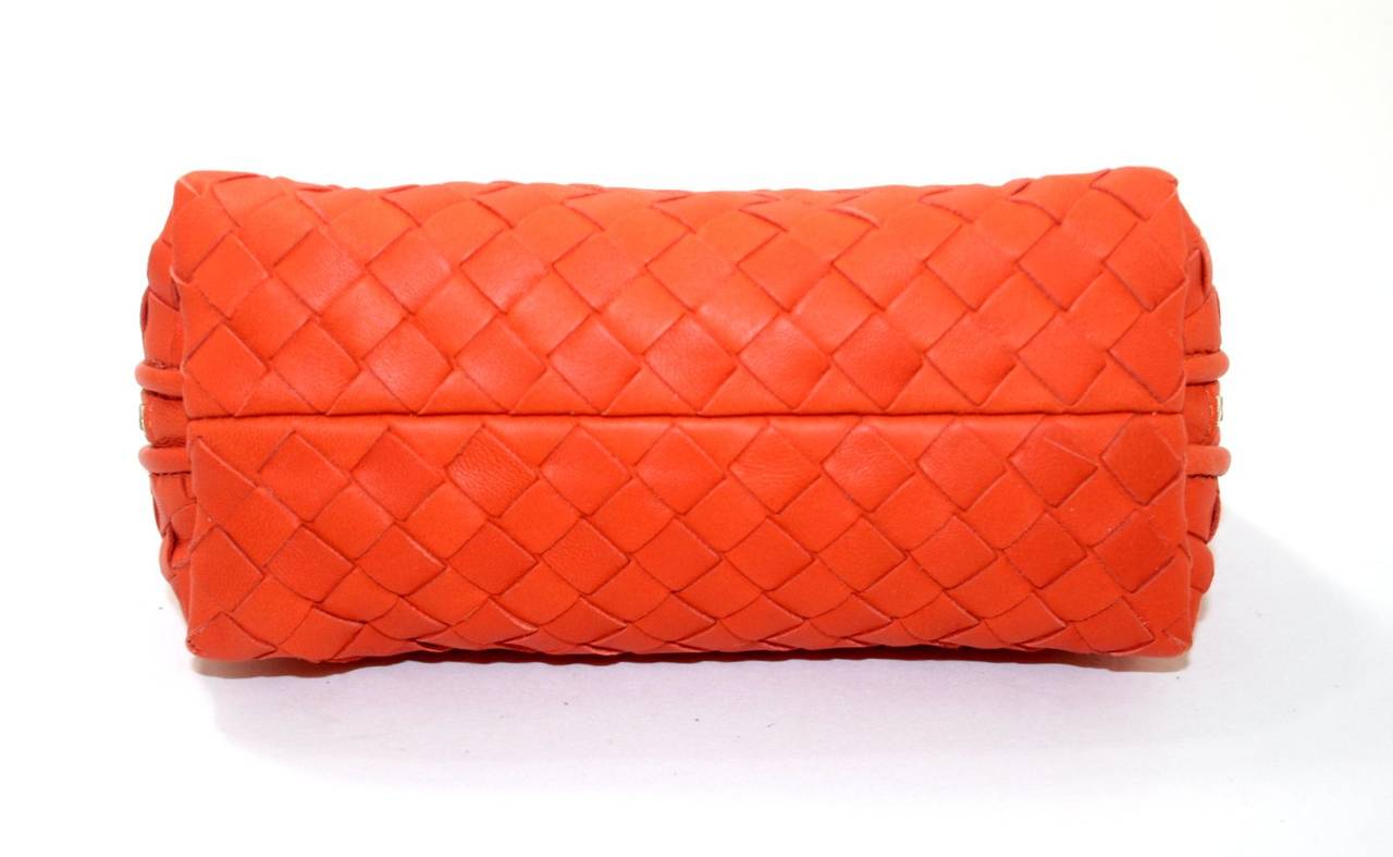 Women's Bottega Veneta Orange Woven Leather Cosmetic Case