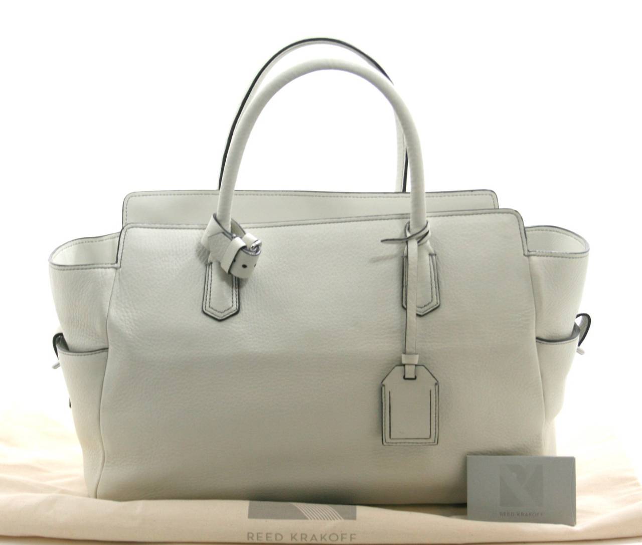 Reed Krakoff’s Chalk White Pebbled Leather Tote is a store return in mint condition.   With no significant sign of wear other than creases from storage, it makes a brilliant find for a savvy shopper.  Retail price $890.00.

Creamy white pebbled