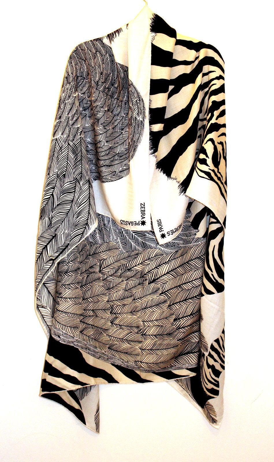 Never worn, this Hermès Zebra Pegasus Cashmere and Silk GM Shawl still has the tag attached.   The Alice Shirley design features a wild African Zebra with feathered wings outstretched, inspired by the myth of Pegasus.  It may be worn as a shawl or a