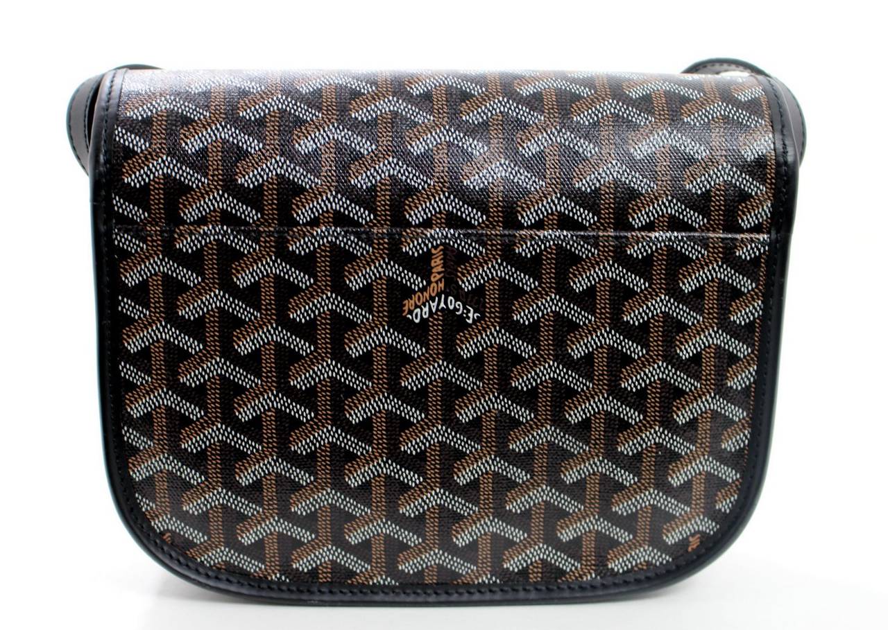 Brand new, this Black Belvedere Small Messenger bag from Goyard is perfect for daily wear throughout the year. Known for its exclusivity, Goyard is wildly popular with celebrities.  In fact, Goyard has been providing handbags and luggage to royalty