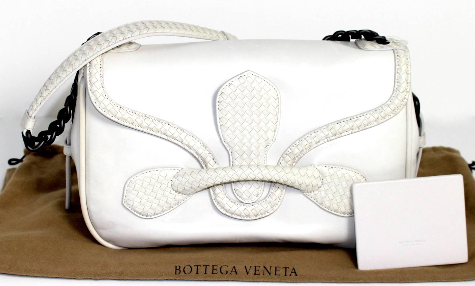 Bottega Veneta Mist New Calf Rialto Shoulder Bag-  Current Retail $2,450.00.  Excellent condition.  Rarely carried; minor signs of handling. 

The medium sized shoulder bag is a current style from BV although this pretty shade of winter white is