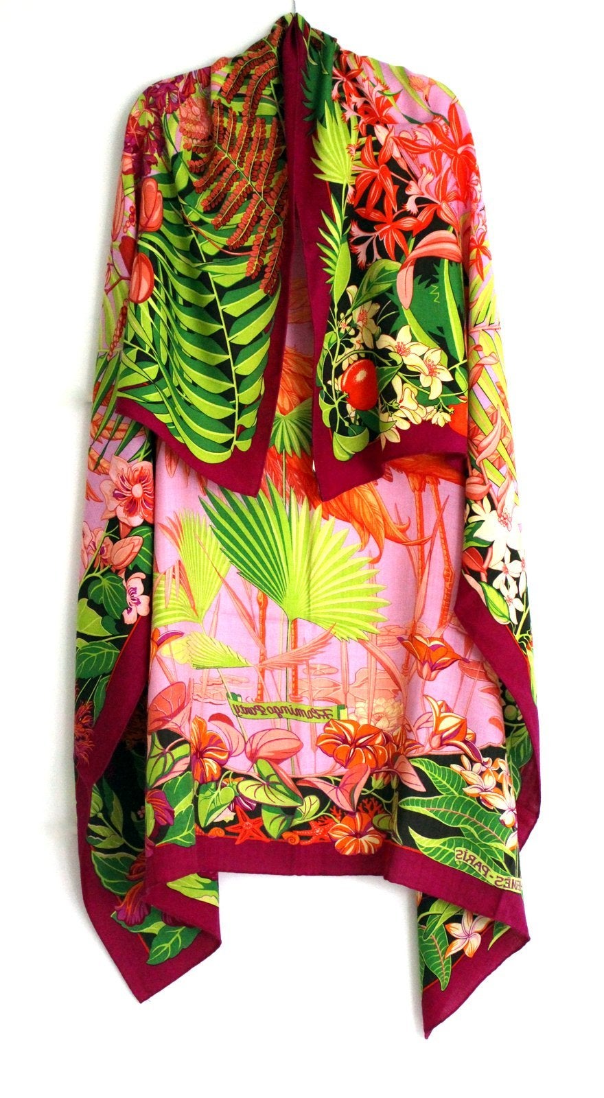 Store fresh with tag attached, this Hermès Flamingo Party Shawl is beautiful and collectible.      Brightly colored exotic tableau featuring two love struck pink flamingos.   Laurence Toutsy Bourthoumieux design.  Bougainvillier, mauve,