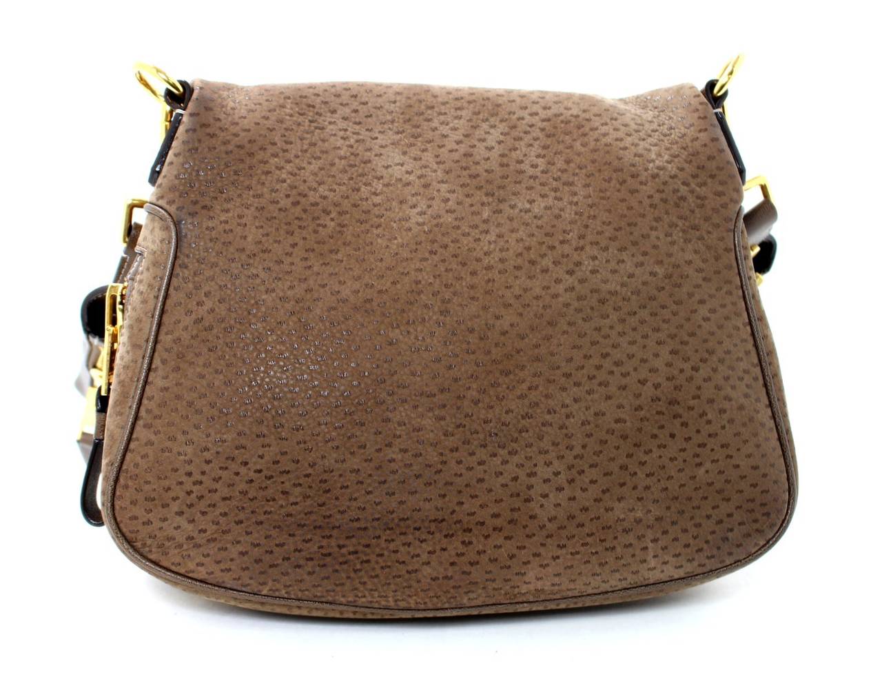 A former store display in pristine condition, Tom Ford Peccary Jennifer Messenger Bag is a beautiful collectible piece.  Designed and named for actress Jennifer Anniston, the style comes in a multitude of fabrications and sizes.  This rare version