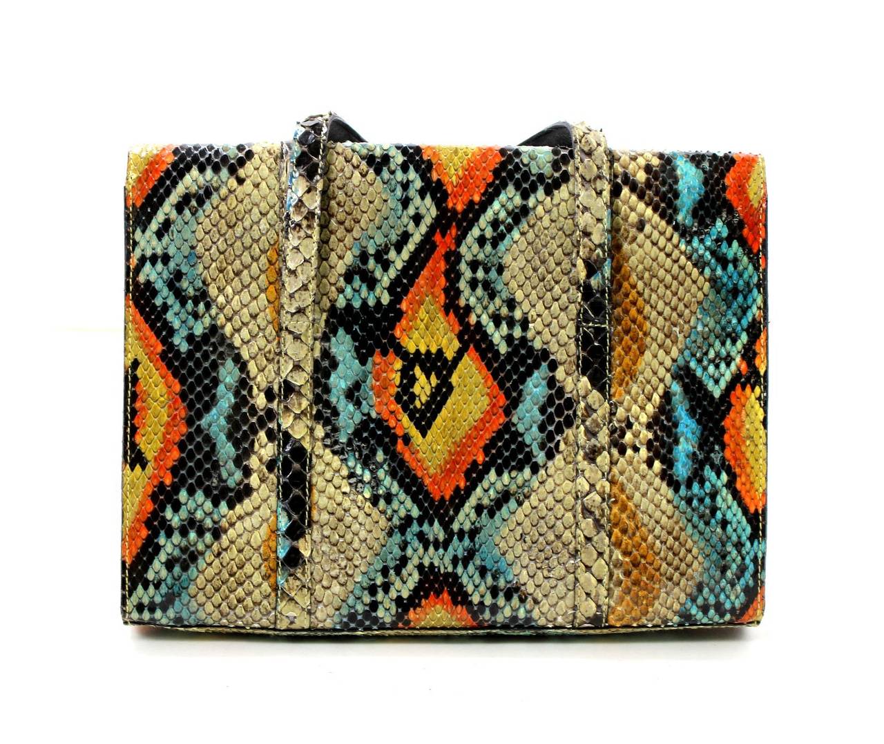 Chanel’s Multicolored Python Flap Satchel is a fantastic fond for a savvy shopper.  It is in excellent plus condition with some light scratches beneath the flap from normal use.   A slim and sophisticated style that delivers a vibrant pop to any