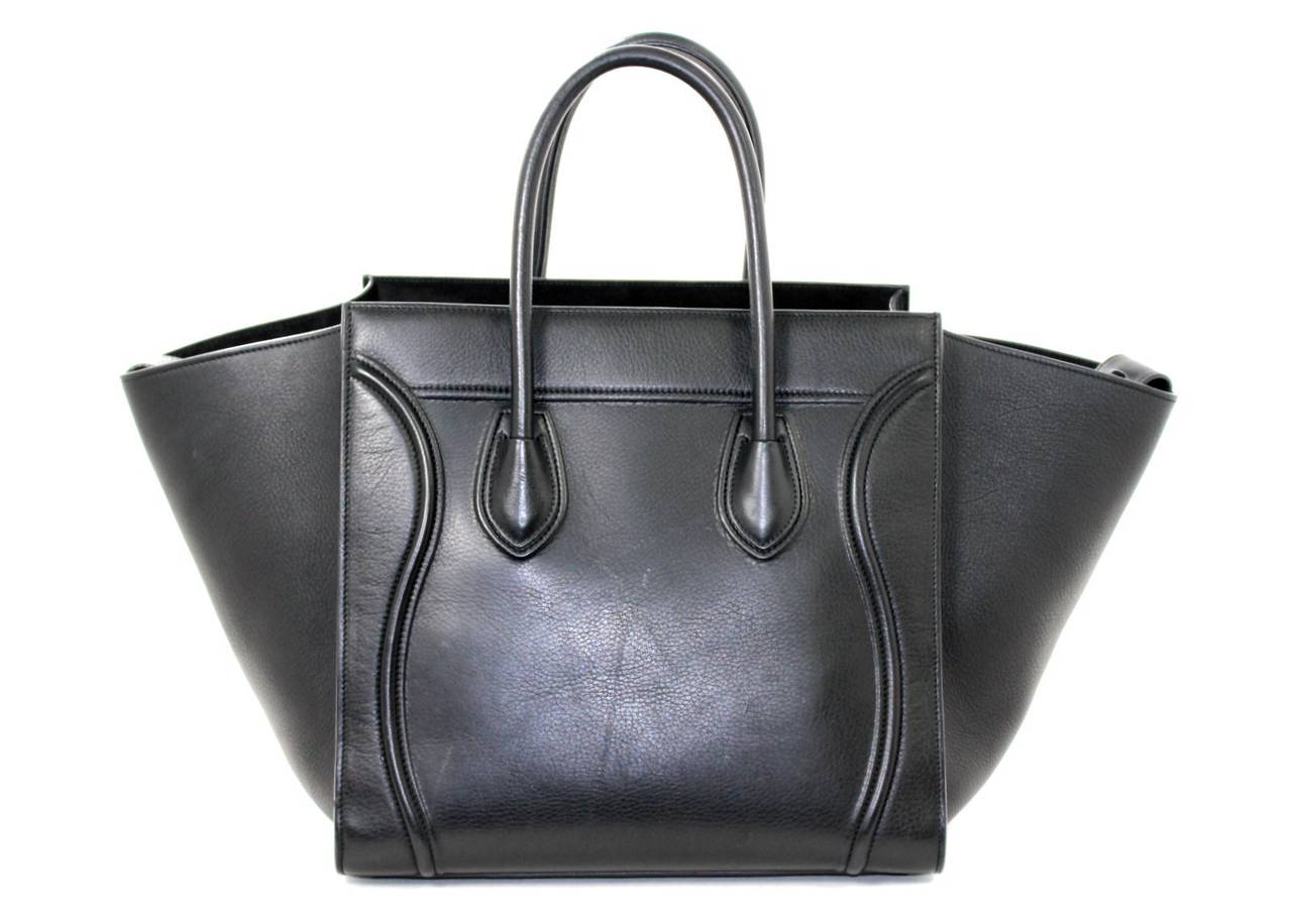 Celine Phantom Shopper in Black Leather- excellent condition with only some light surface mars on the rear from normal light use.   The iconic style makes a great alternative to the much more expensive Hermes Birkin without compromising quality or
