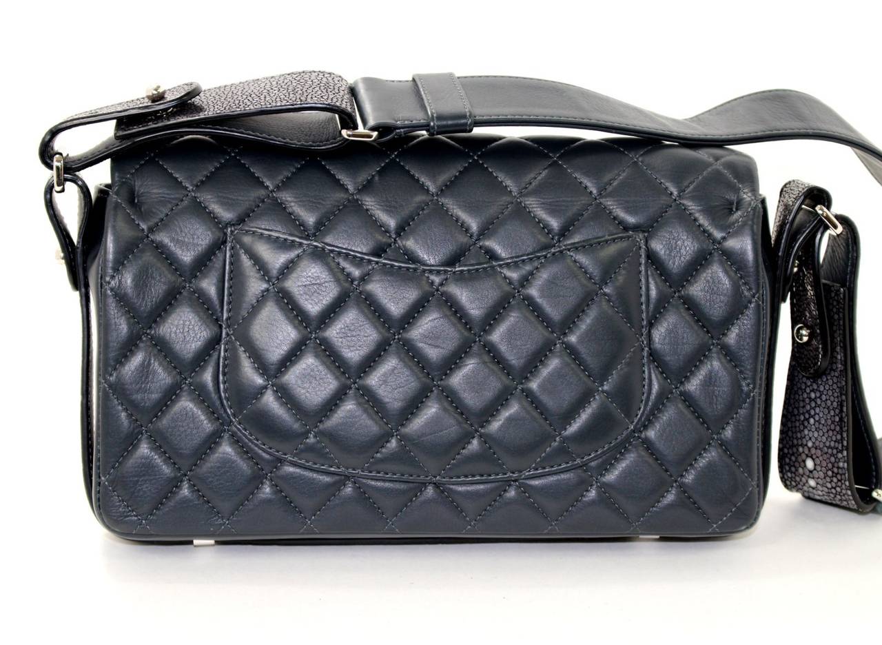 CHANEL Grey Leather Stingray Strap Bag- Never carried, pristine condition
Very rare Chanel showcases an artistic beaded stingray strap that may be worn cross body or on the shoulder.  Limited edition, collectible.  Retail $8,000.00.
Dark grey