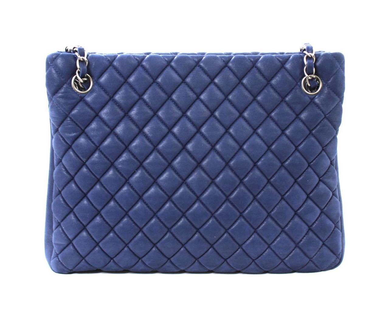 CHANEL Quilted Leather Tote- vivid cobalt blue with dark silver hardware
Never carried PRISTINE condition (former store display).

Deep cornflower blue brushed leather is quilted in signature Chanel diamond stitched pattern.  Dark silver hardware