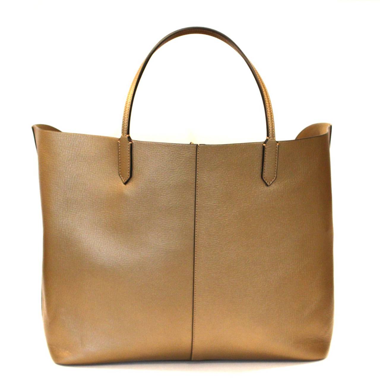 Givenchy Gold Textured Leather Antigona Tote- Brand new, PRISTINE.
 
Perfectly proportioned, light weight and beyond chic, the Antigona from Givenchy is a stylish and practical tote.  Carried every day throughout the year.  Retail price $2,518.00.