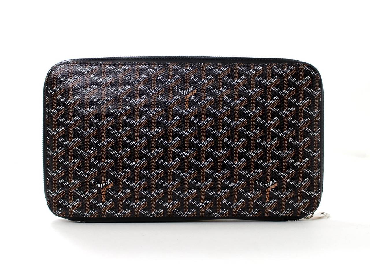 GOYARD Black Opera Unisex Wallet- NEW with box

Special order item from Goyard- waitlist required.   Opera Unisex wallet is also known as a travel wallet or portfolio.    Retail price $2,295.00 plus taxes.
Signature Goyard chevron print on black