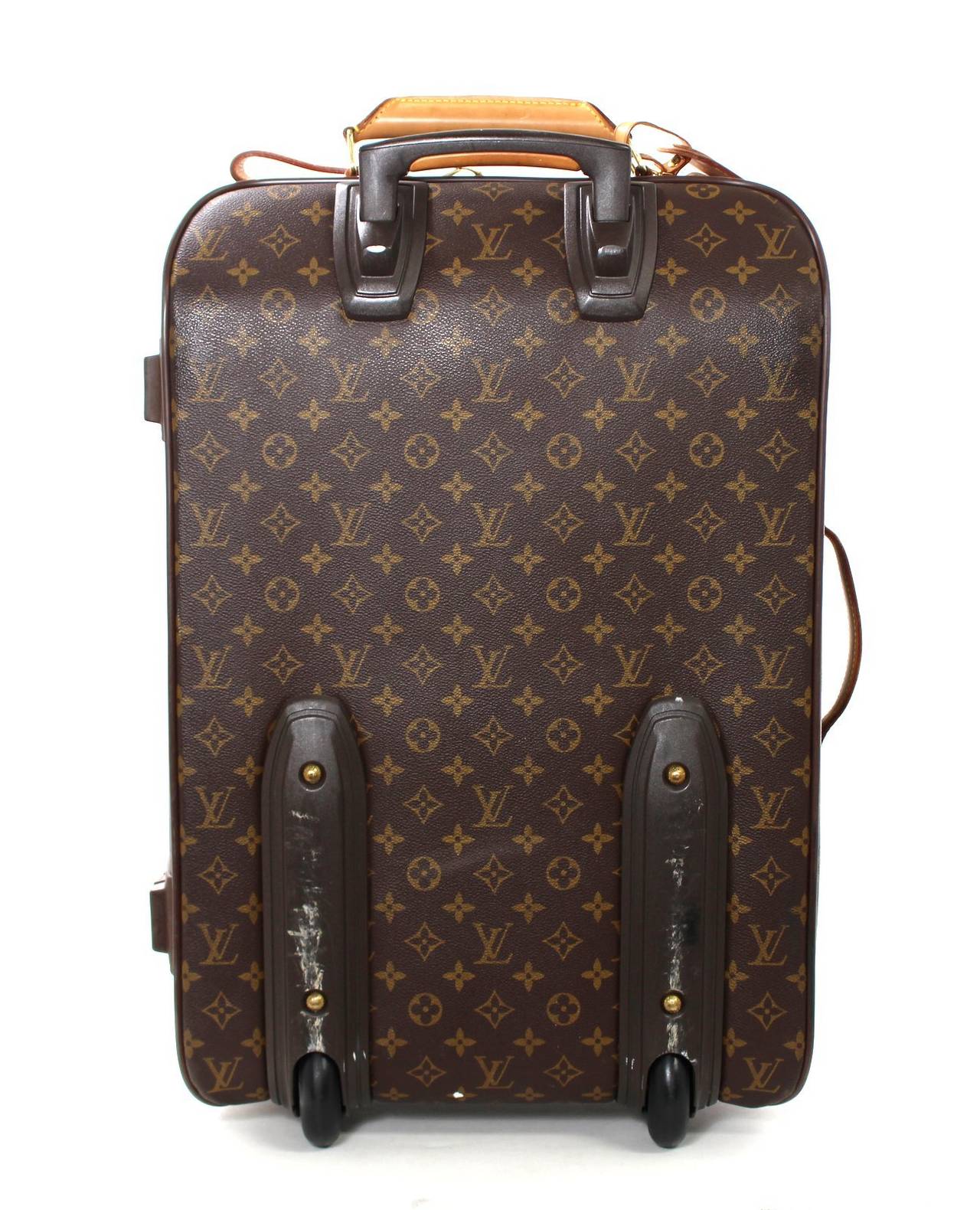Louis Vuitton Monogram Canvas Rolling Travel 55 Luggage- VERY GOOD  to EXCELLENT condition

Signs of normal light use. The current Pegase 55 is very similar to this retired version.  It is the medium size rolling trolley in the 55 size which