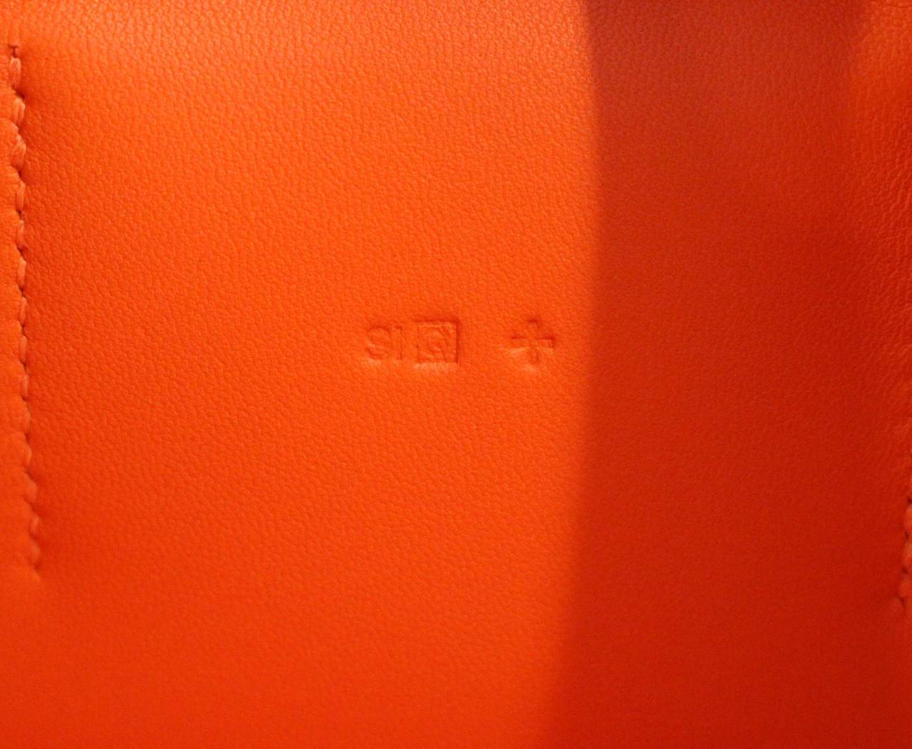 Hermes Orange Duo Wallet- Togo with PHW For Sale at 1stdibs  