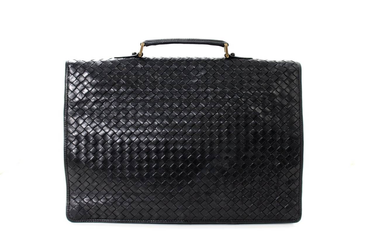 Excellent condition- Bottega Veneta Black Woven Leather Briefcase
Current very similar style from Bottega retails for over $2,900.00 with taxes.  This unisex style is a fantastic find for a savvy shopper.  There is some mild scratching on the