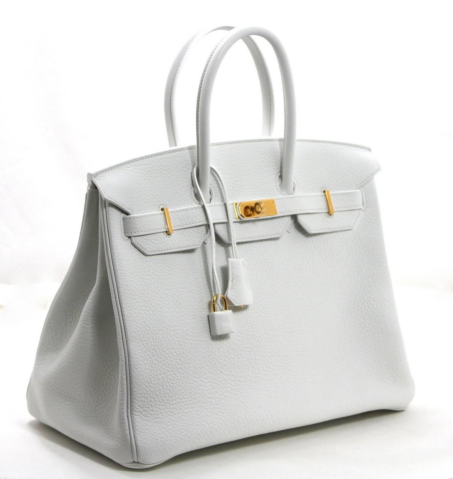 Hermès White Clemence Leather 35 cm Birkin, T stamp, Gold Hardware- NEVER CARRIED. Plastic on all hardware.
Nearly impossible to get, the handcrafted White Birkin is elusive and highly desirable.  The penultimate in luxury.  Only offered in