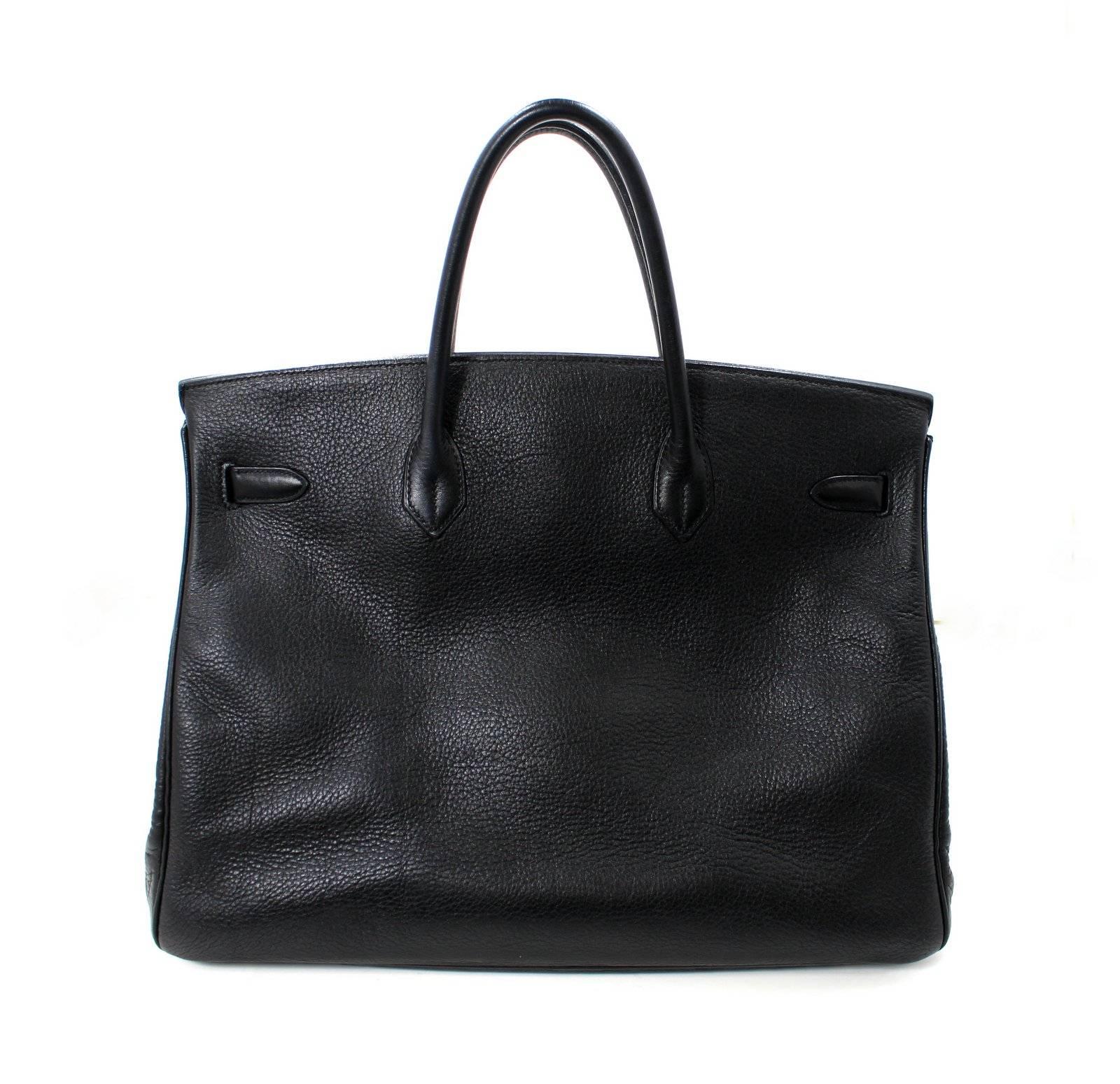 Hermès Black Buffalo Birkin- 40 cm, A stamp, Gold Hardware
VERY GOOD CONDITION with signs of general light use

The initials “D.A.W.” are subtly embossed in black on the front.   There is light wear on the corners, bottom and hardware.   The