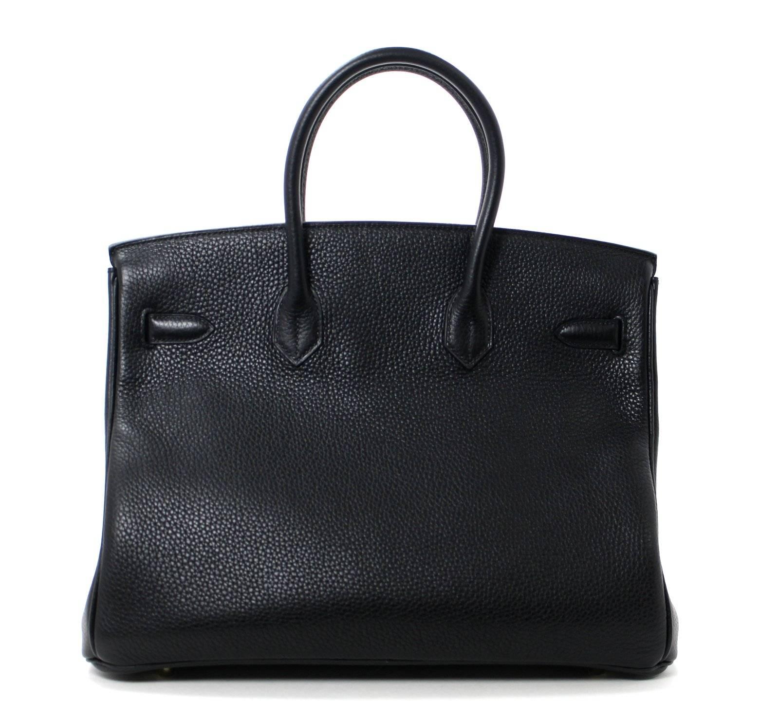 Pristine, store fresh condition (plastic on hardware) Hermès Birkin Bag in BLACK Togo Leather, GHW 35 cm, T stamp

Purchase includes padlock, keys, clochette, protective felt, raincoat, dust bags and Hermès box with tissue. 
Crafted by hand and