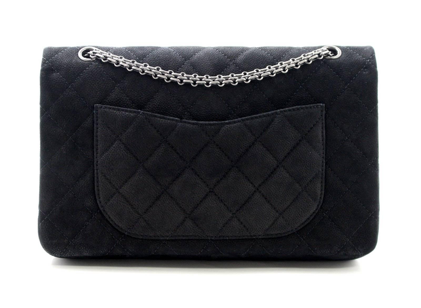 Chanel Black Nubuck Leather 2.55 Large Shoulder Bag- Retail price $6,000.00; NEVER CARRIED!!!
Breathtaking Chanel Flap Bag is largest size, 2.55.  Black Nubuck leather with Ruthenium hardware.

Black Nubuck leather has a texture like caviar and