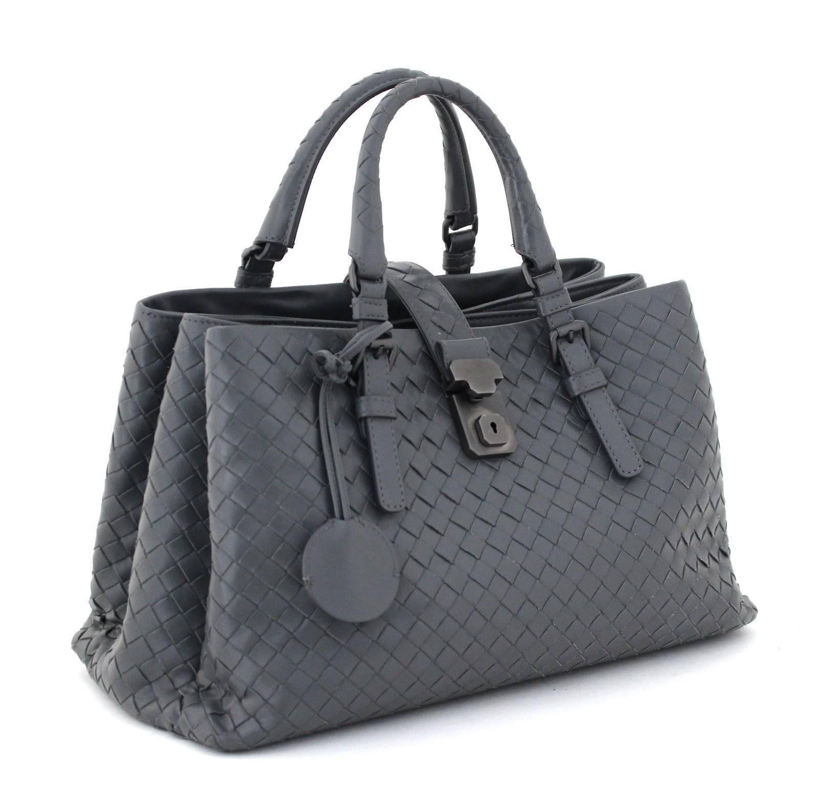 Bottega Veneta  Grey Leather Roma Small Tote- Retail $3,600
Mint Condition!  This iconic piece of the BV collection has been rarely carried and carefully stored.  Offered significantly below the current retail price, it is a brilliant find that is