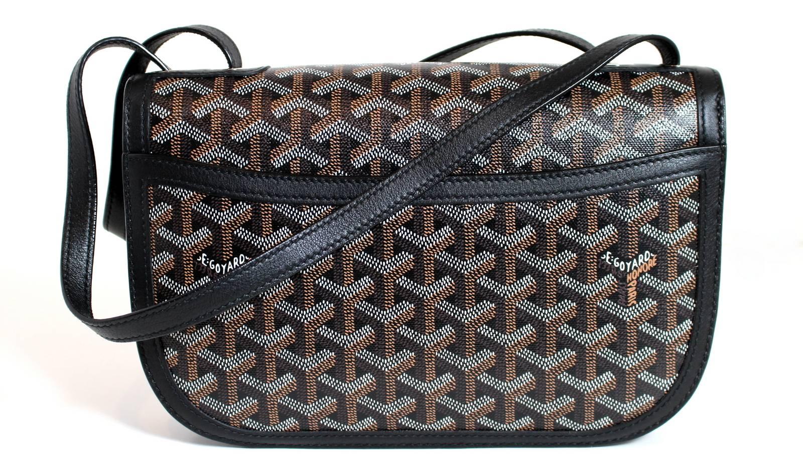 Black Monogram 233 Goyard Shoulder Bag with Wallet- New
Retail $5,180.00 plus taxes.  
Unusually rare style has only recently become available in the U.S.    

The 233 Goyard is constructed of a durable coated fabric and black leather.  