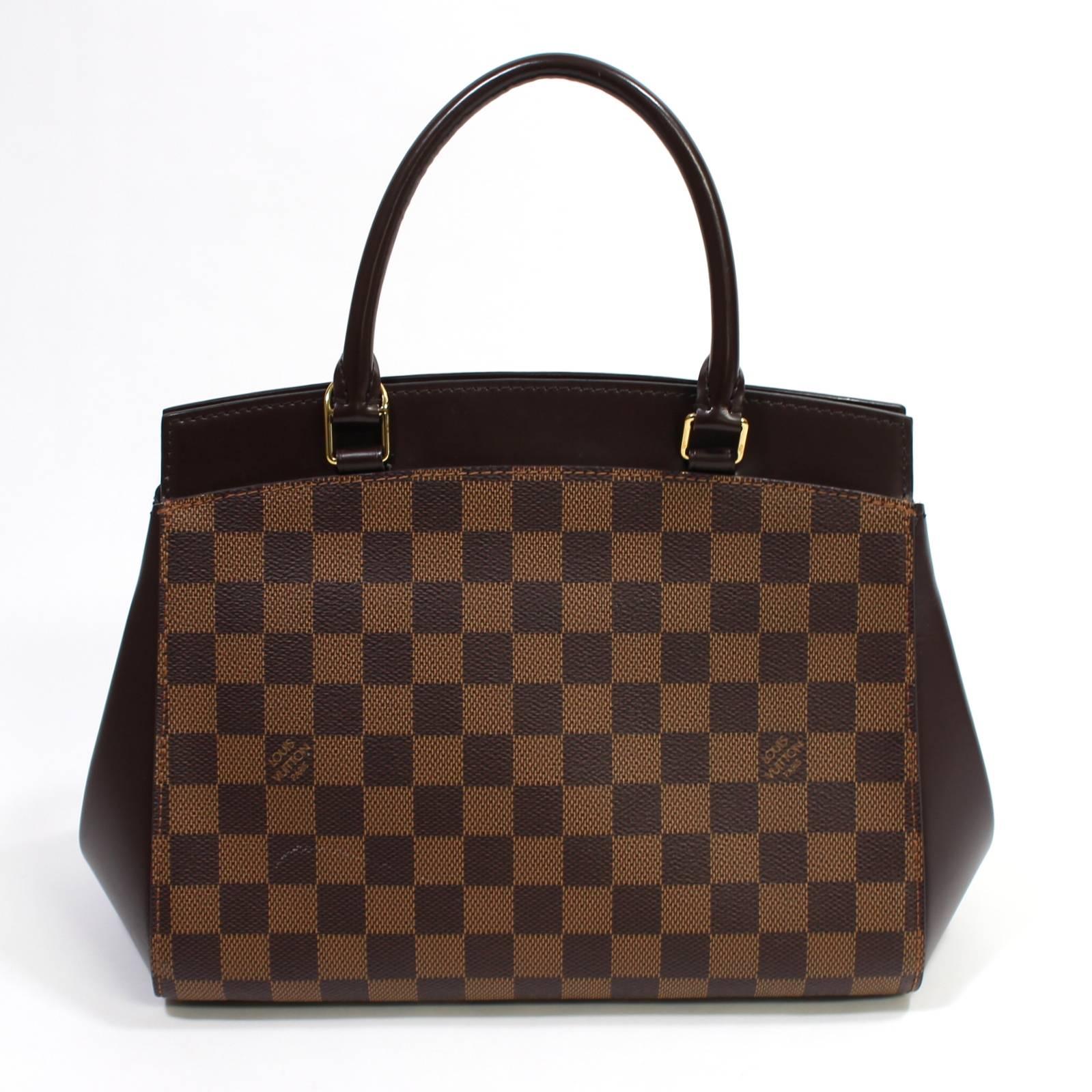 Louis Vuitton Damier Ebene Rivoli BB- Excellent PLUS 
Retail $2,260.00
Light white mark on the rear left side.  Otherwise it appears nearly pristine.
Sophisticated and classic, the Rivoli BB is perfectly scaled for every day.  Signature LV coated