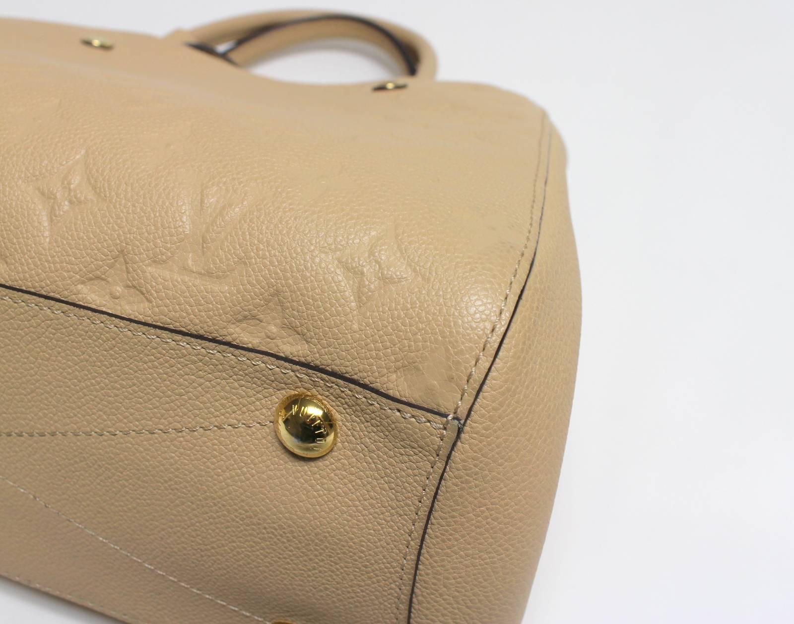 Women's Louis Vuitton Dune Monogram Empreinte Leather Montaigne MM Bag For Sale