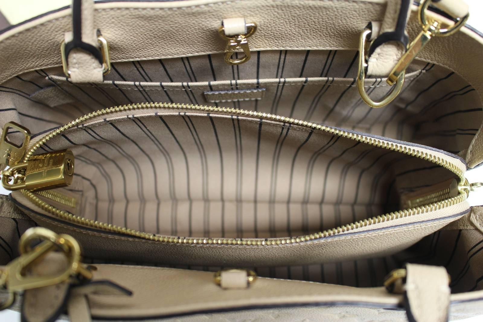 Louis Vuitton Dune Monogram Empreinte Leather Montaigne MM Bag For Sale 3