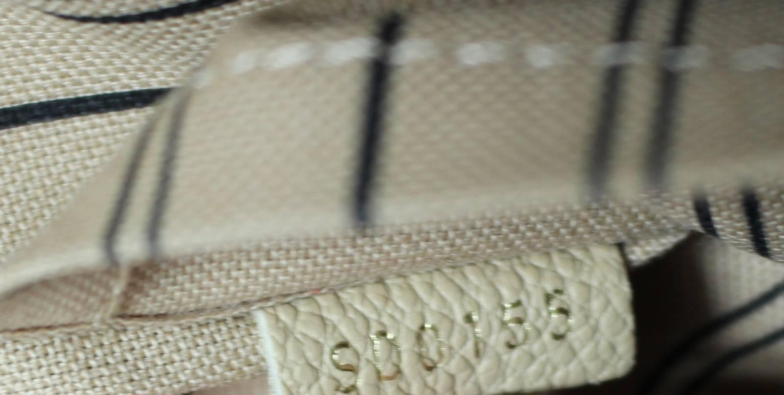 Louis Vuitton Dune Monogram Empreinte Leather Montaigne MM Bag For Sale 5
