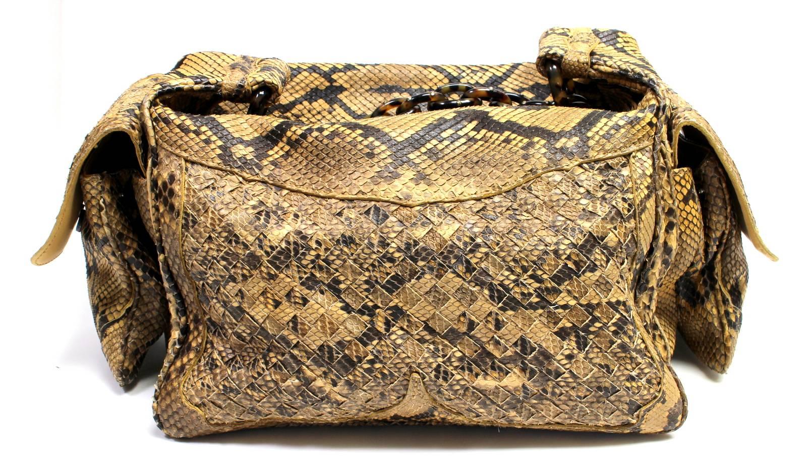 Bottega Veneta Python Crocker Bag- in PRISTINE condition. Retail $5,400.00.
 The rare exotic has a beautiful neutral coloration and fabulous tortoise chain handle.  
Brown and tan python skin flap bag has a concealed magnetic snap closure.  Two