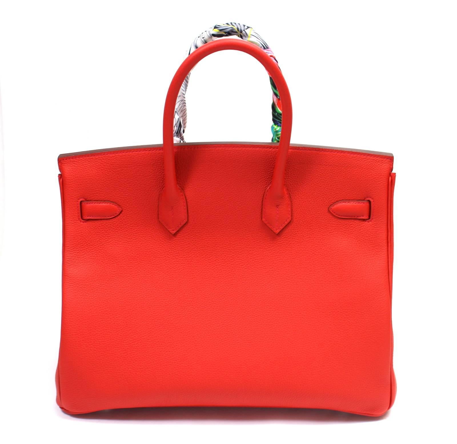 STORE FRESH Hermès Geranium Togo Leather 35 cm Birkin Bag
  The plastic is intact on all the hardware; Never Carried.  
Sought-after RED pop color remarkably complements most other hues.  
 Handcrafted by skilled craftsmen and coveted by the fashion