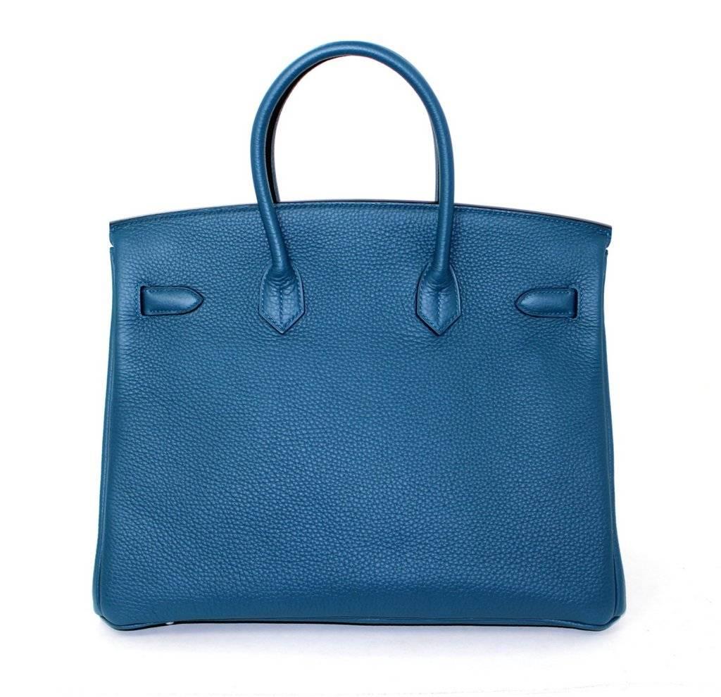 Hermès BLUE COLVERT 35 cm Birkin Bag is PRISTINE.  Store fresh (plastic on hardware) with padlock, keys, clochette, protective felt, raincoat, dust bags and Hermès box with tissue.  
World recognized as the penultimate luxury item, wait lists of