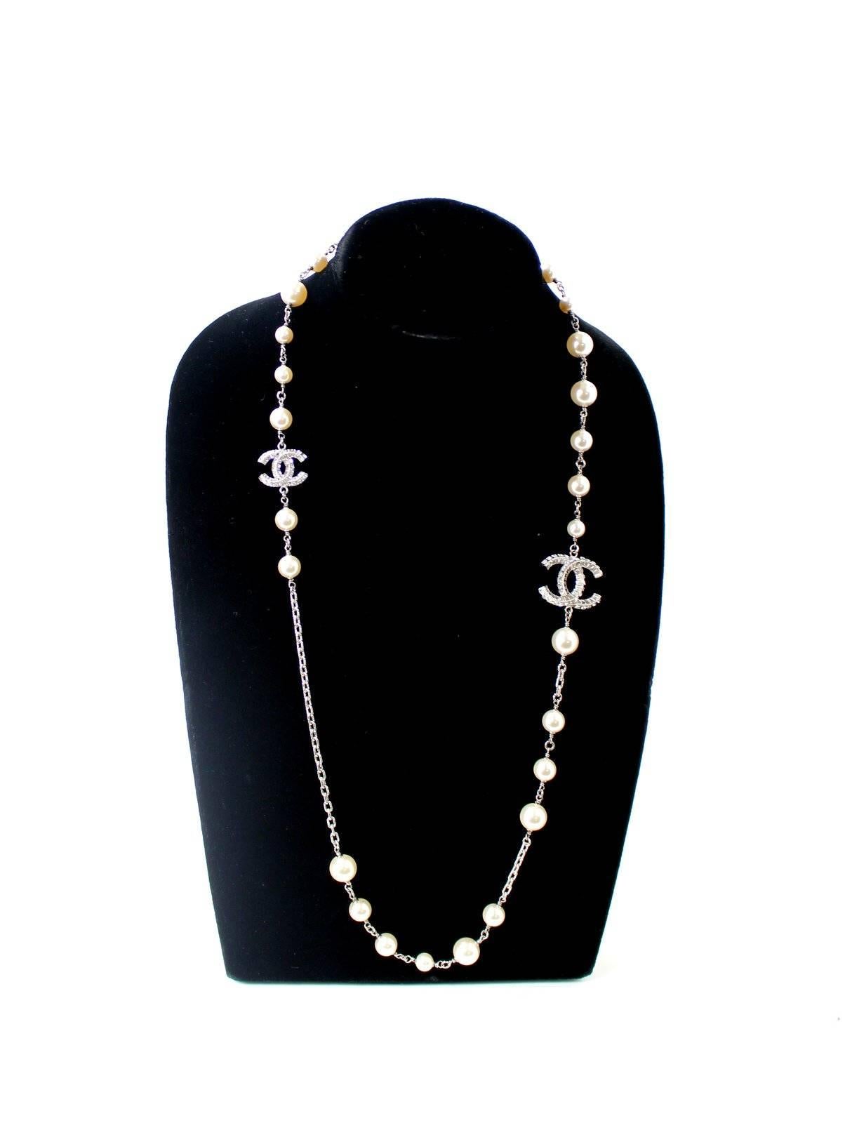 Chanel Silver and Pearl CC Long Necklace- MINT Retail $2,300.00
The classic Chanel piece can be worn at differing lengths and with virtually anything from a tee to a gown. A brilliant addition to any collection, this Chanel is versatile and