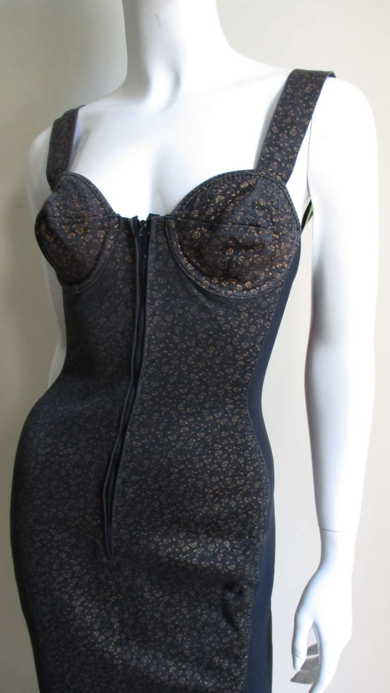 Fabulous dress from Junior Gaultier brown with tiny gold flowers in a  synthetic fabric from the early Madonna days when underwear moved to outer wear.  It is a corset style with a multi top stitched underwire bra top with wide straps.  There is a
