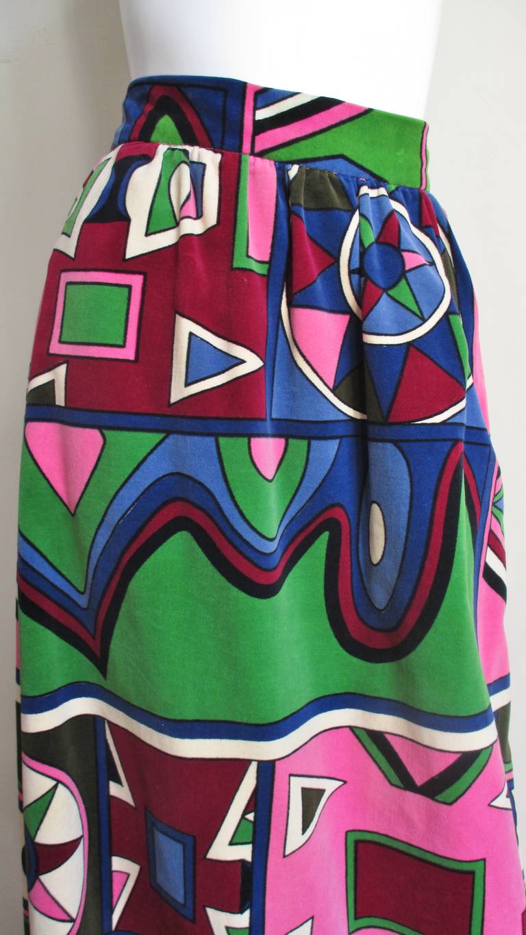 A fabulous brightly colored mod, abstract pattern velvet maxi skirt from Mignon.  The skirt is gathered onto a 2