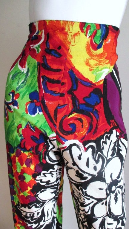 Amazing Gianni Versace Couture silk faille pants from one of his earlier couture collections.  They have a fitted slightly higher waist in the most beautiful bright explosion of colors and patterns - circles, flowers, stripes with baroque