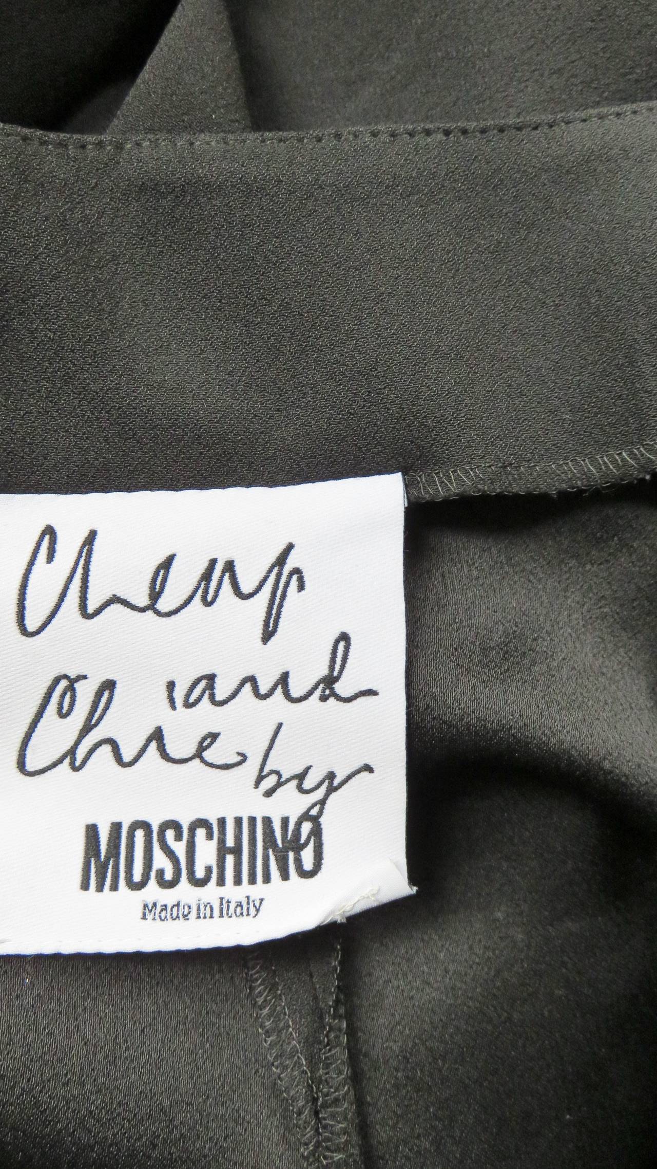 Moschino Halter Tuxedo Jumpsuit For Sale at 1stDibs | tuxedo style jumpsuit