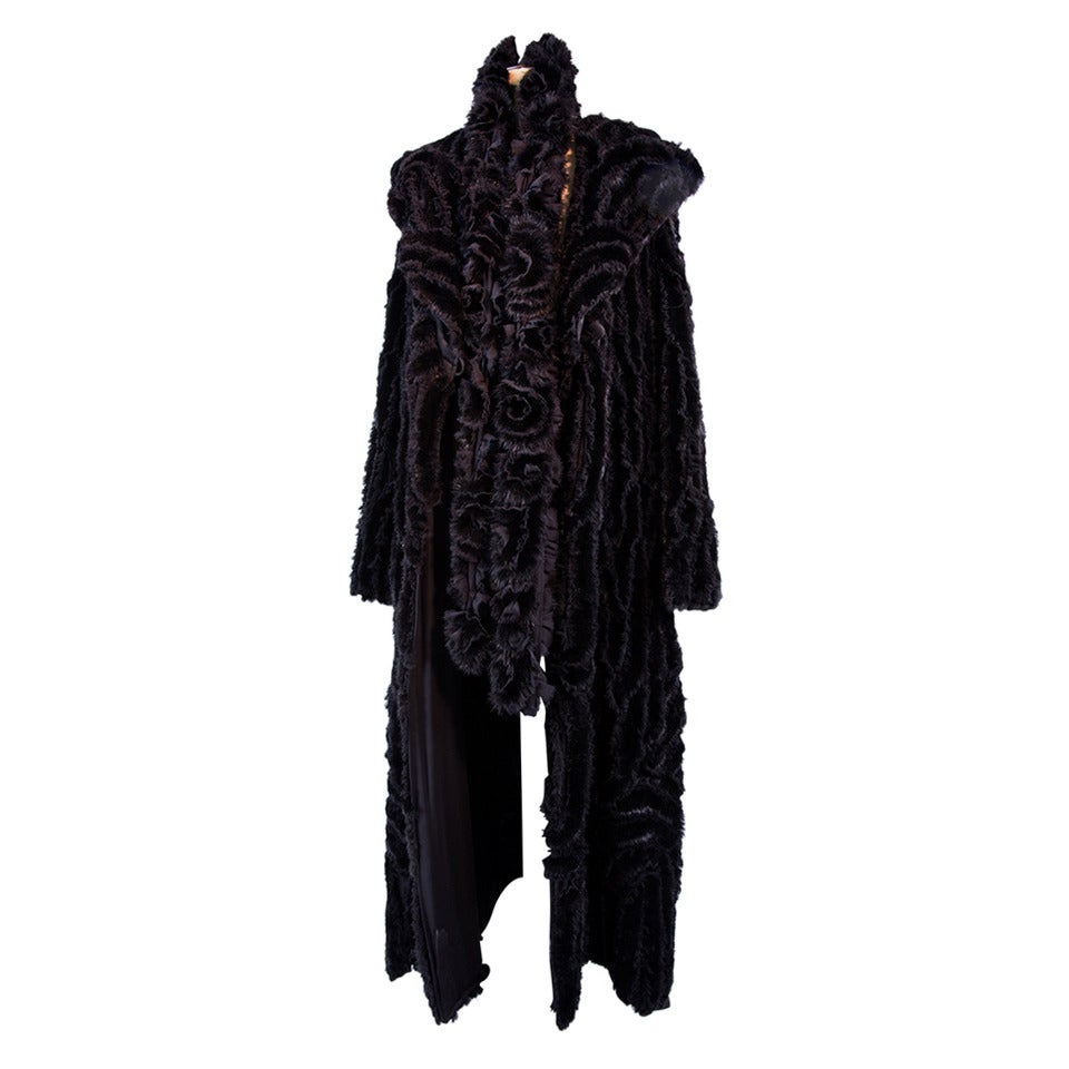 Ooh La La…Beautiful Black Mink and Silk Ribbon Shawl Collar Statement Coat, so amazing, soft and touchable, you'll never want to take it off! Fully lined with 100% silk; semi-fitted, yet flares at just the right point to look amazingly slimming. To