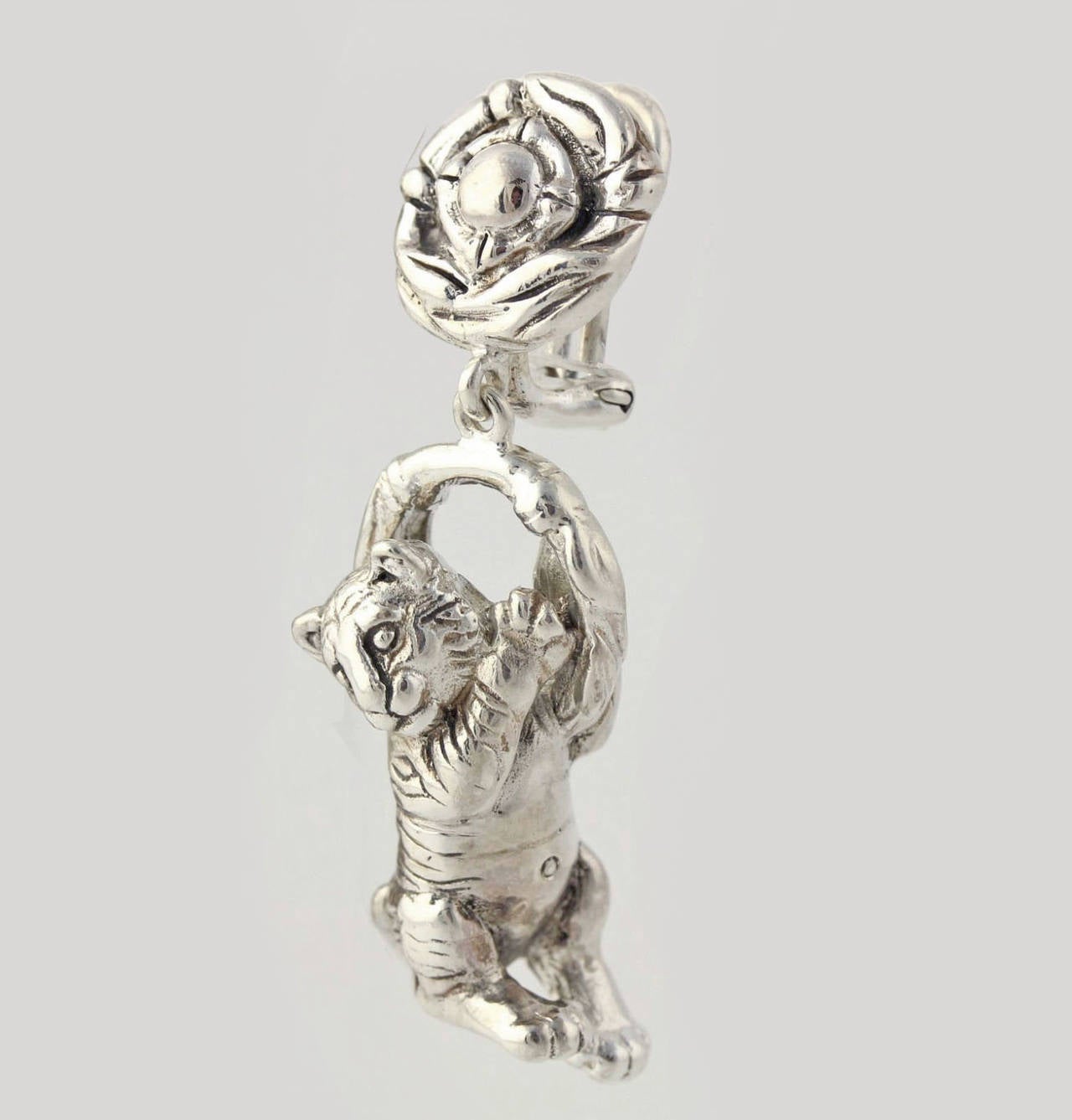 Delightful Tiger Cub clip-on back Drop Earrings by Designer Barry Kieselstein Cord are sure to brighten your day and make you smile! A playful tiger cub hangs on to a bamboo ring with its front paws suspending from a circular bamboo top. Beautifully