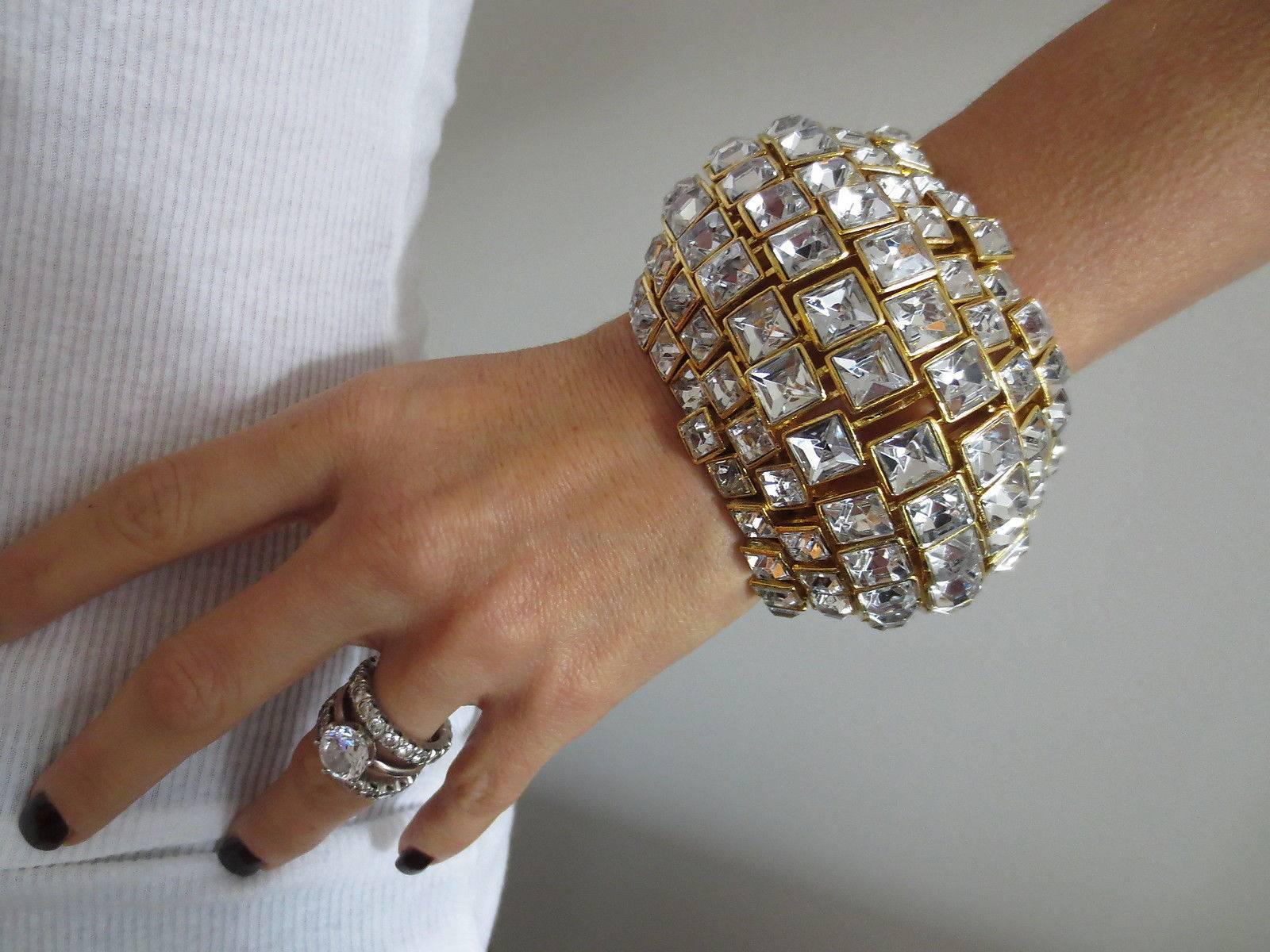 Fabulous Museum Quality domed bracelet set with sparkling CZ stones; gold tone setting. Bracelet measures approx. 2.75