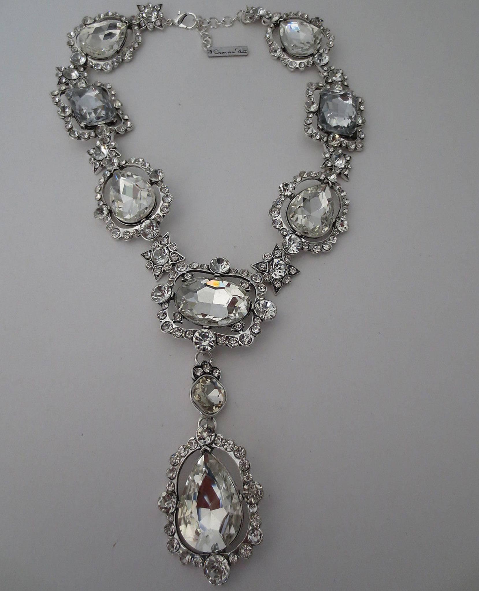 Beautiful signed Oscar de la Renta Runway Faux Diamond crystal Chunky necklace; approx. 20 inches; long with massive center drop approx. 5 inches. Awesome and Fabulous as you are! 
