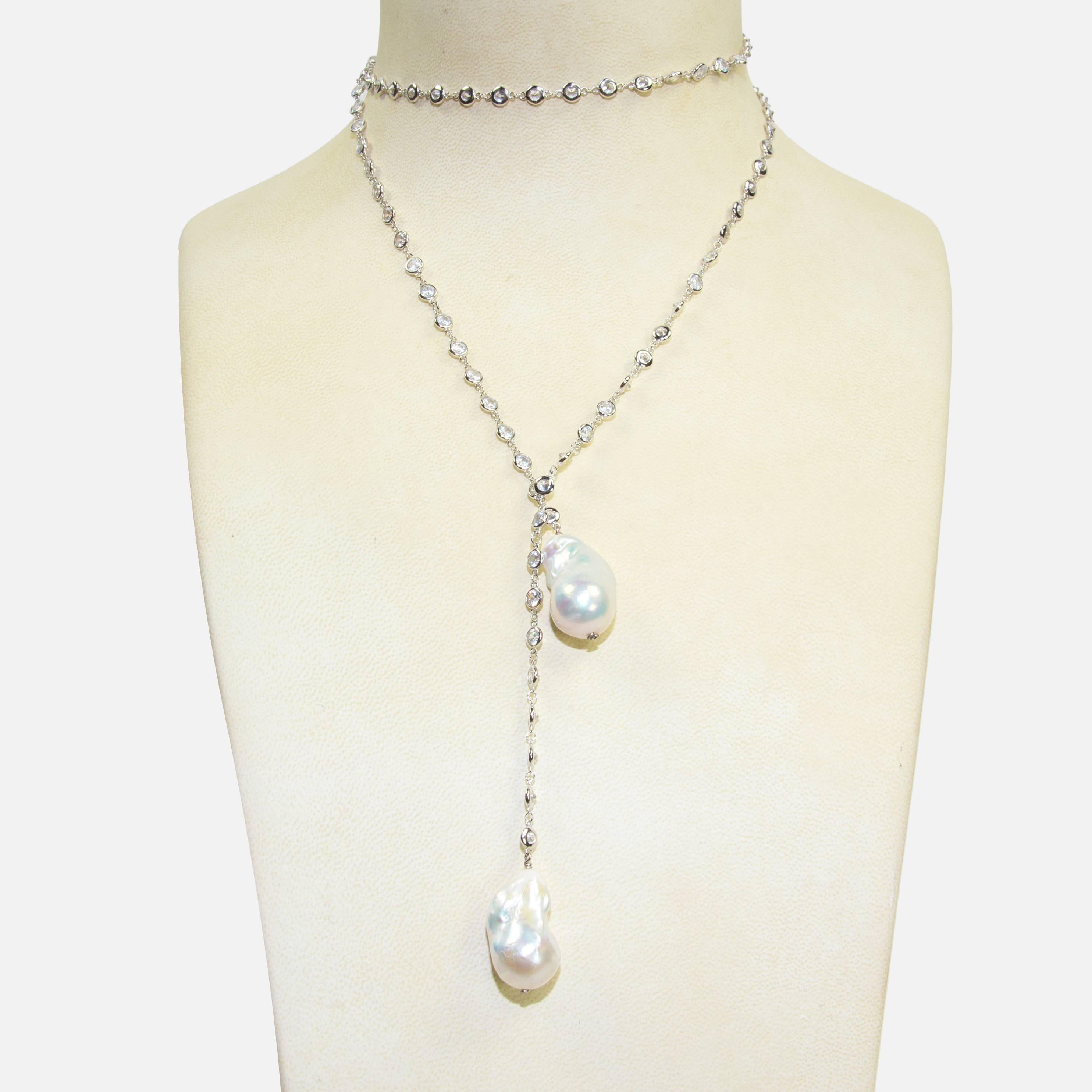 Fabulous Statement Necklace with Glittering Cubic Zirconium CZ chain, suspending two large Cultured Freshwater Baroque Pearls, Sterling Silver CZ chain; approx. 32 inches; long plus each pearl measuring approx. 1 inch. Classic and Timeless, taking