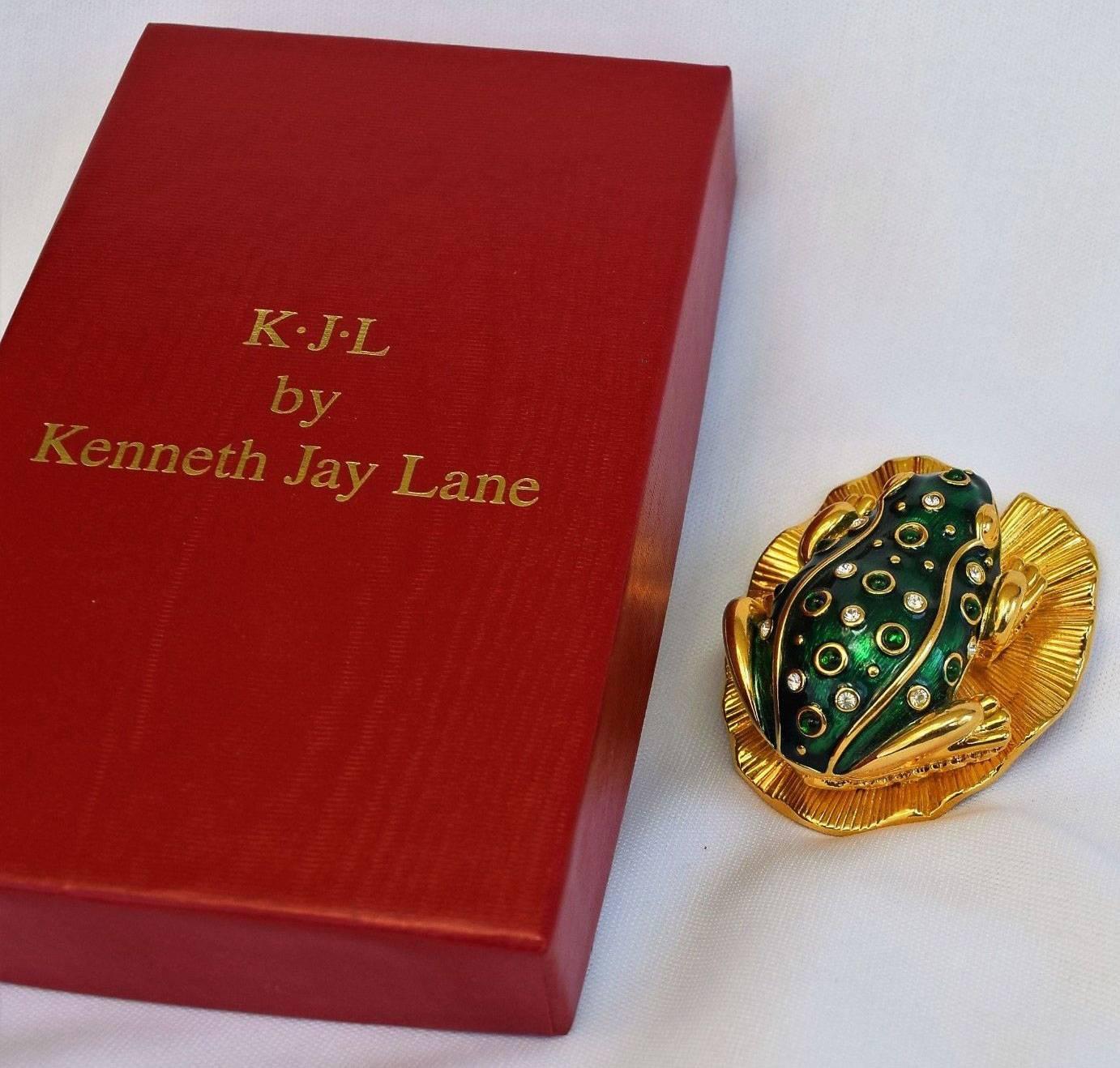 Fabulous signed Kenneth J Lane combination enameled green frog brooch and pill box. Complete in original box. Limited edition. Approx. pin size: 1.75